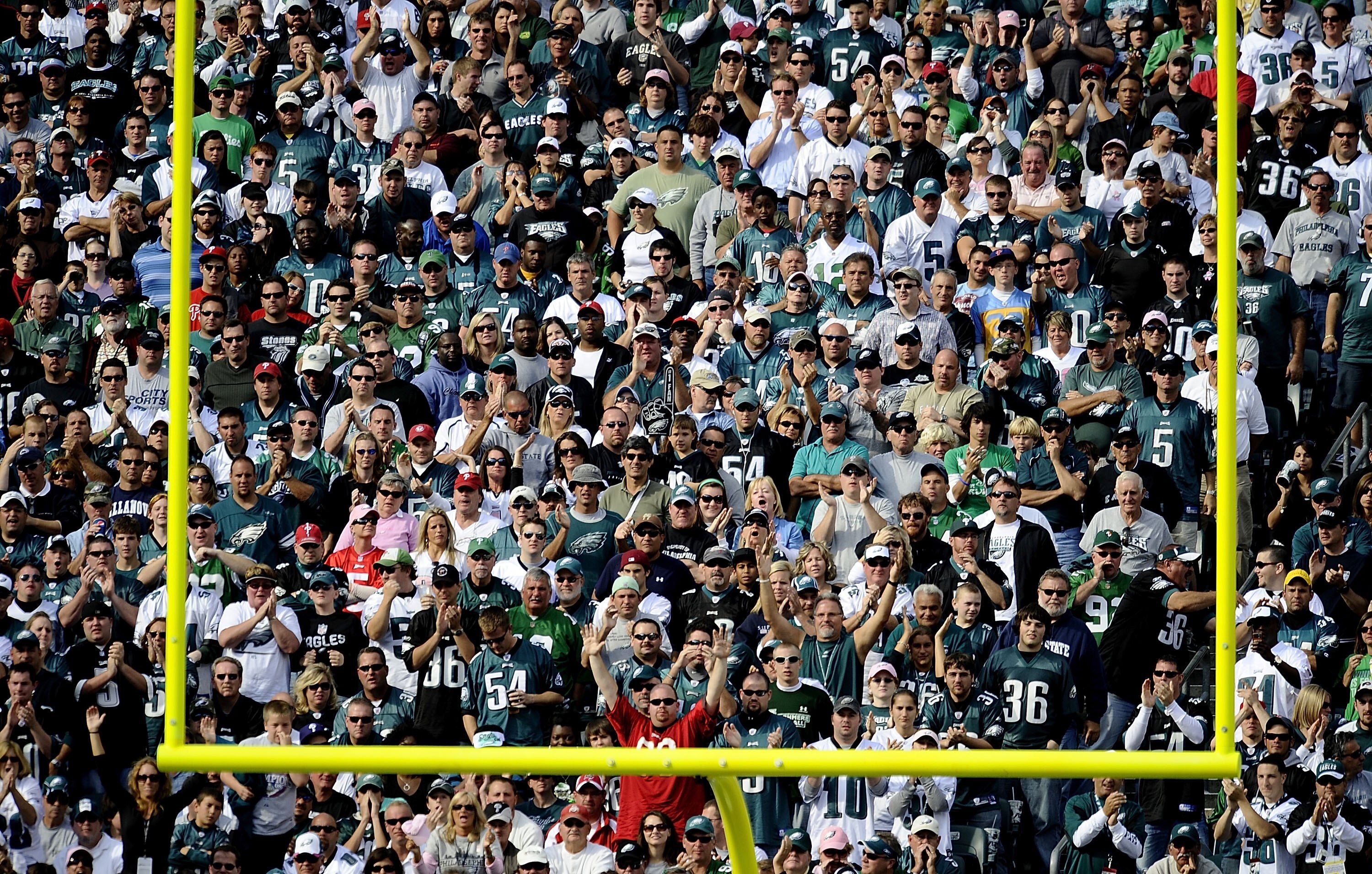 PHILADELPHIA - OCTOBER 11:  Fans of the Philadelphia Eagles cheer from the stands during a game against the Tampa Bay Buccaneers at Lincoln Financial Field on October 11, 2009 in Philadelphia, Pennsylvania.  (Photo by Jeff Zelevansky/Getty Images)