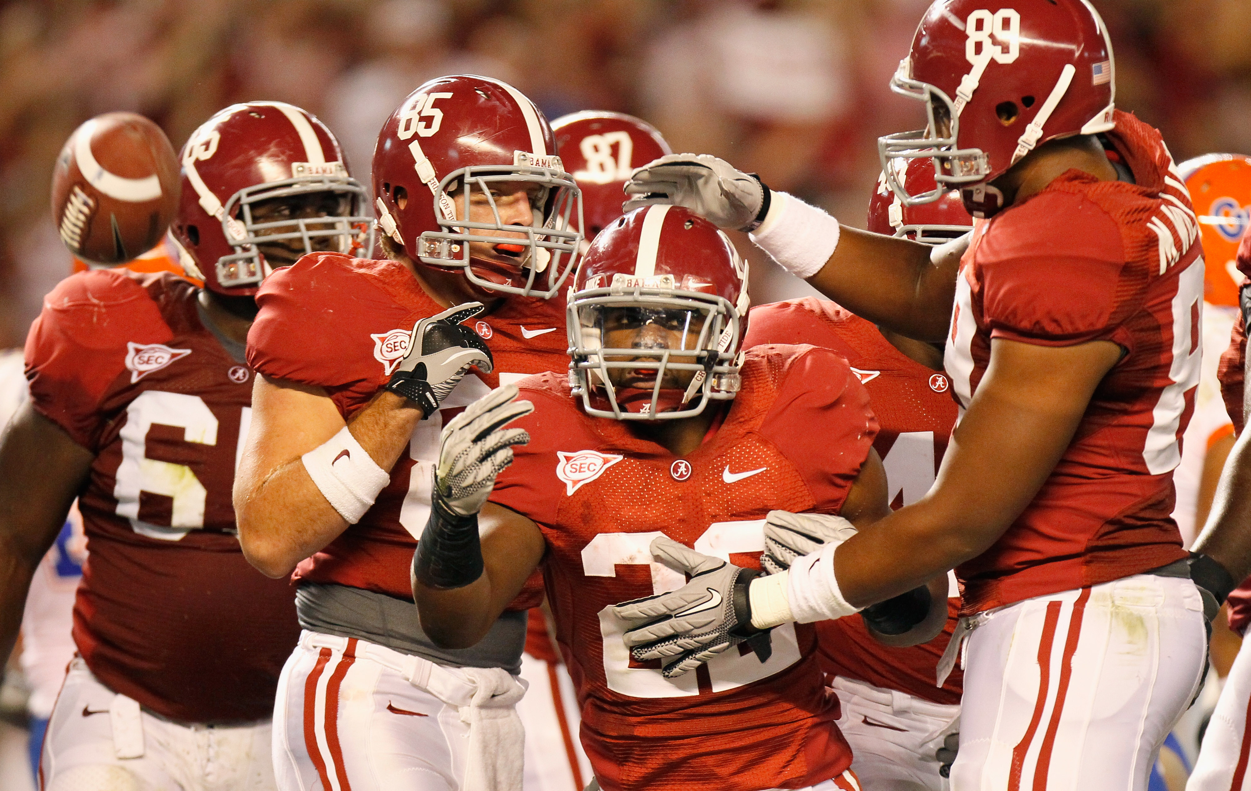 TUSCALOOSA, AL - OCTOBER 02:  Mark Ingram #22 of the Alabama Crimson Tide celebrates his touchdown against the Florida Gators with Preston Dial #85 and Michael Williams #89 at Bryant-Denny Stadium on October 2, 2010 in Tuscaloosa, Alabama.  (Photo by Kevi