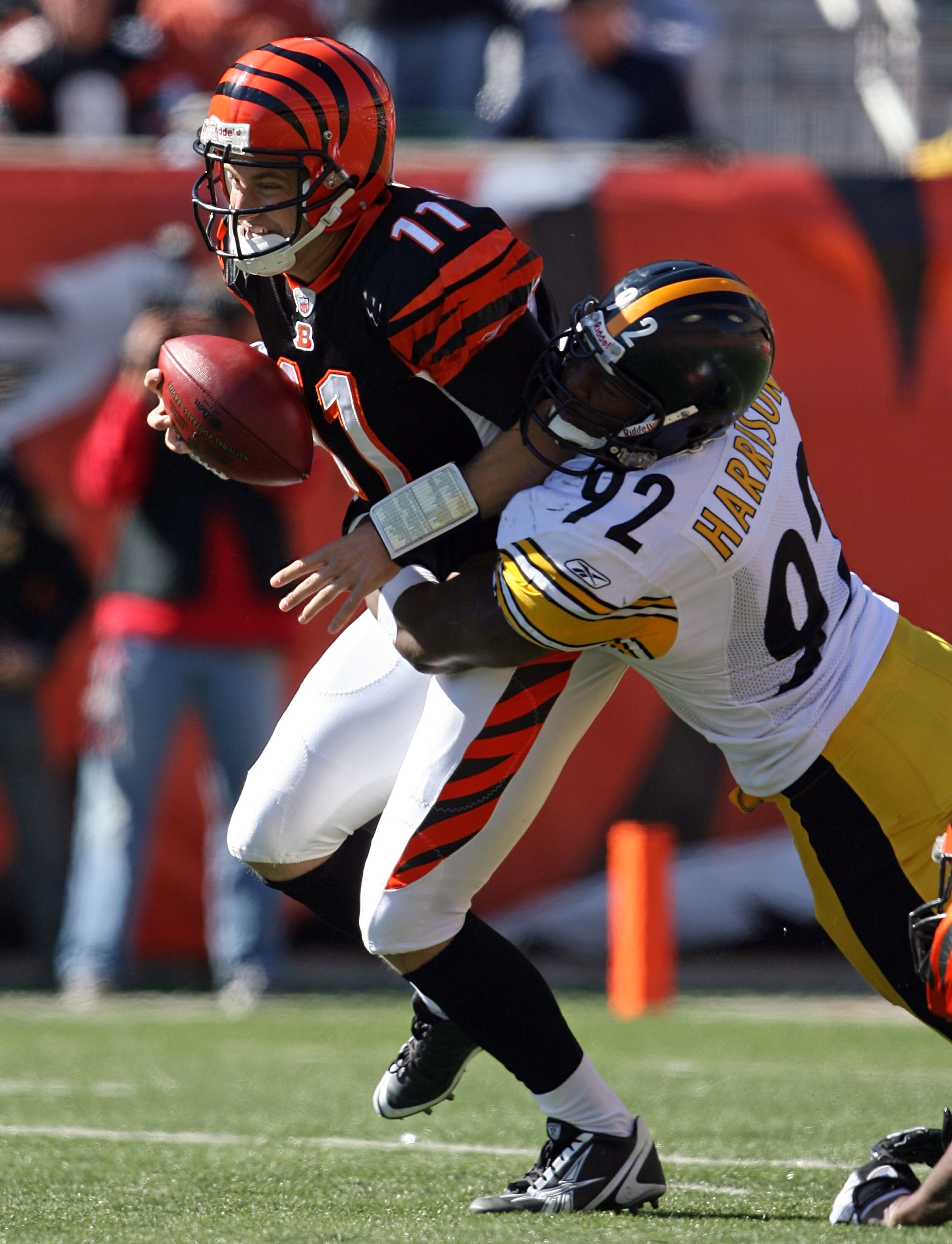 CINCINNATI - OCTOBER 19:  James Harrison #92 of the Pittsburgh Steelers sacks Ryan Fitzpatrick #11 of the Cincinnati Bengals during the NFL game at Paul Brown Stadium on October 19, 2008 in Cincinnati, Ohio.  (Photo by Andy Lyons/Getty Images)