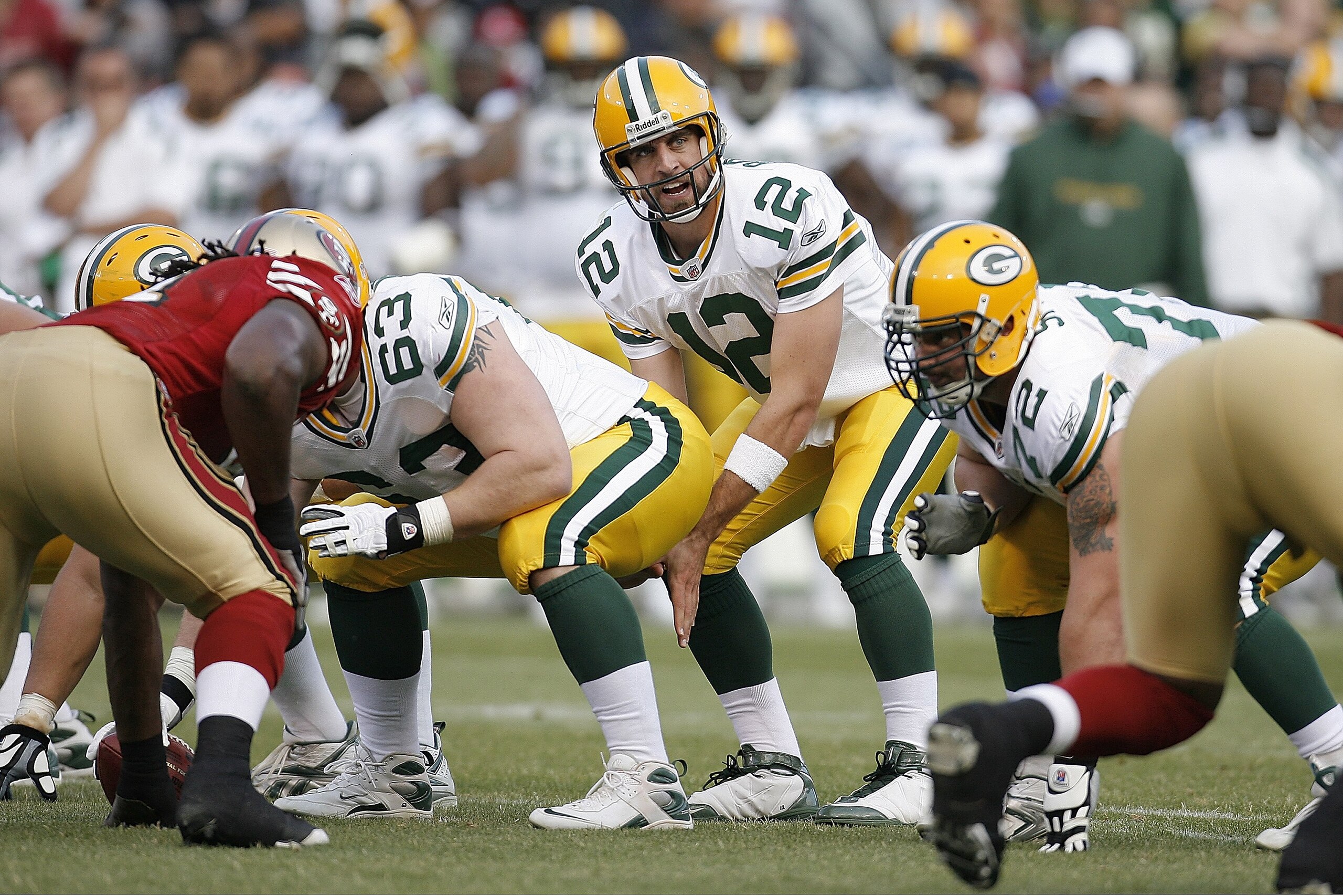 SAN FRANCISC0 - AUGUST 16: Quarterback Aaron Rodgers #12 of the Green Bay Packers calls a play against the San Francisco 49ers during a preseason game on August 16, 2008 at Candlestick Park in San Francisco, California.  (Photo by Greg Trott/Getty Images)