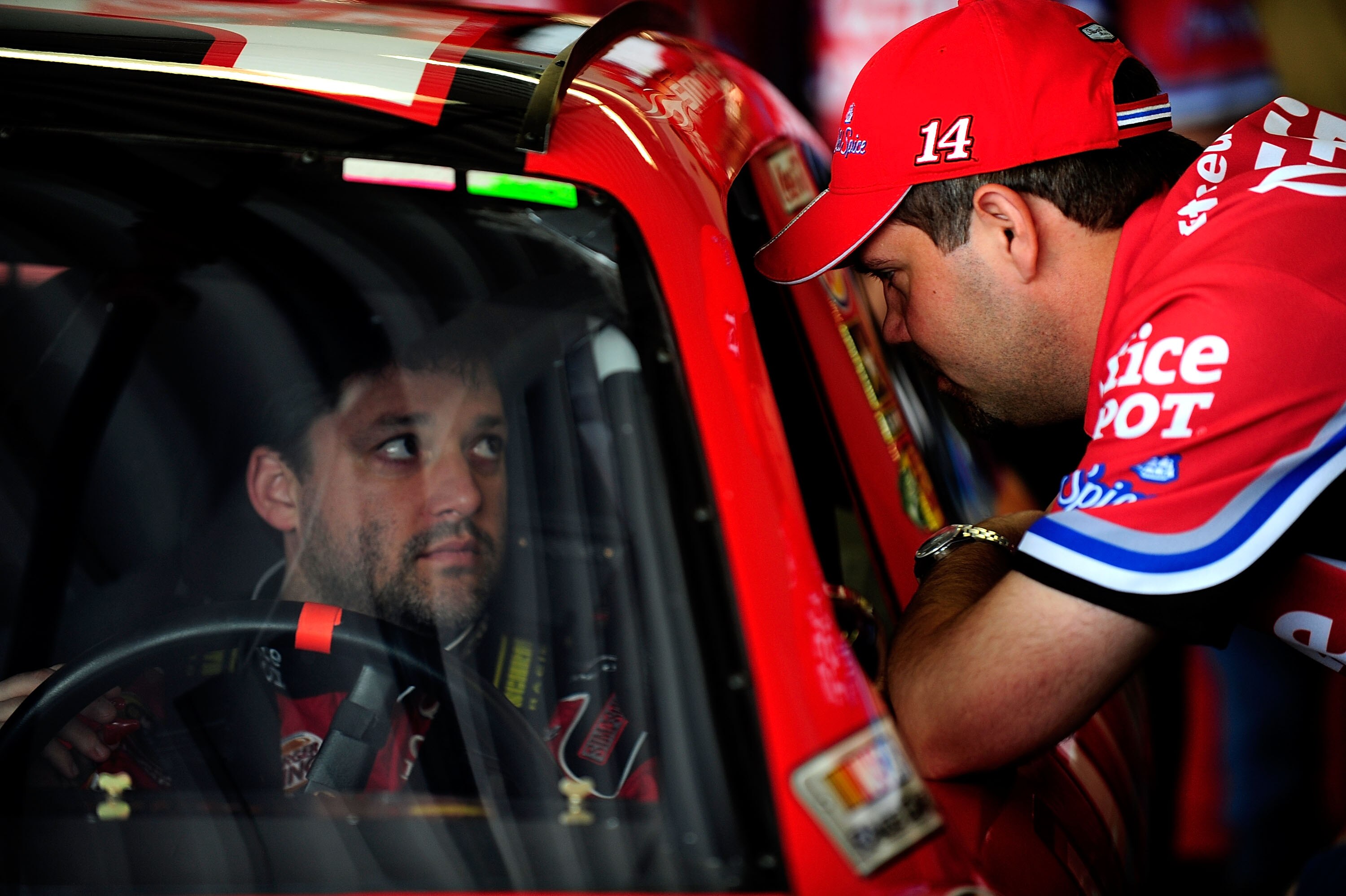 DAYTONA BEACH, FL - FEBRUARY 14:  Tony Stewart (L), driver of the #14 Office Depot/Old Spice Chevorlet, speaks with Darien Grubb during practice for the NASCAR Sprint Cup Series Daytona 500 at Daytona International Speedway on February 14, 2009 in Daytona