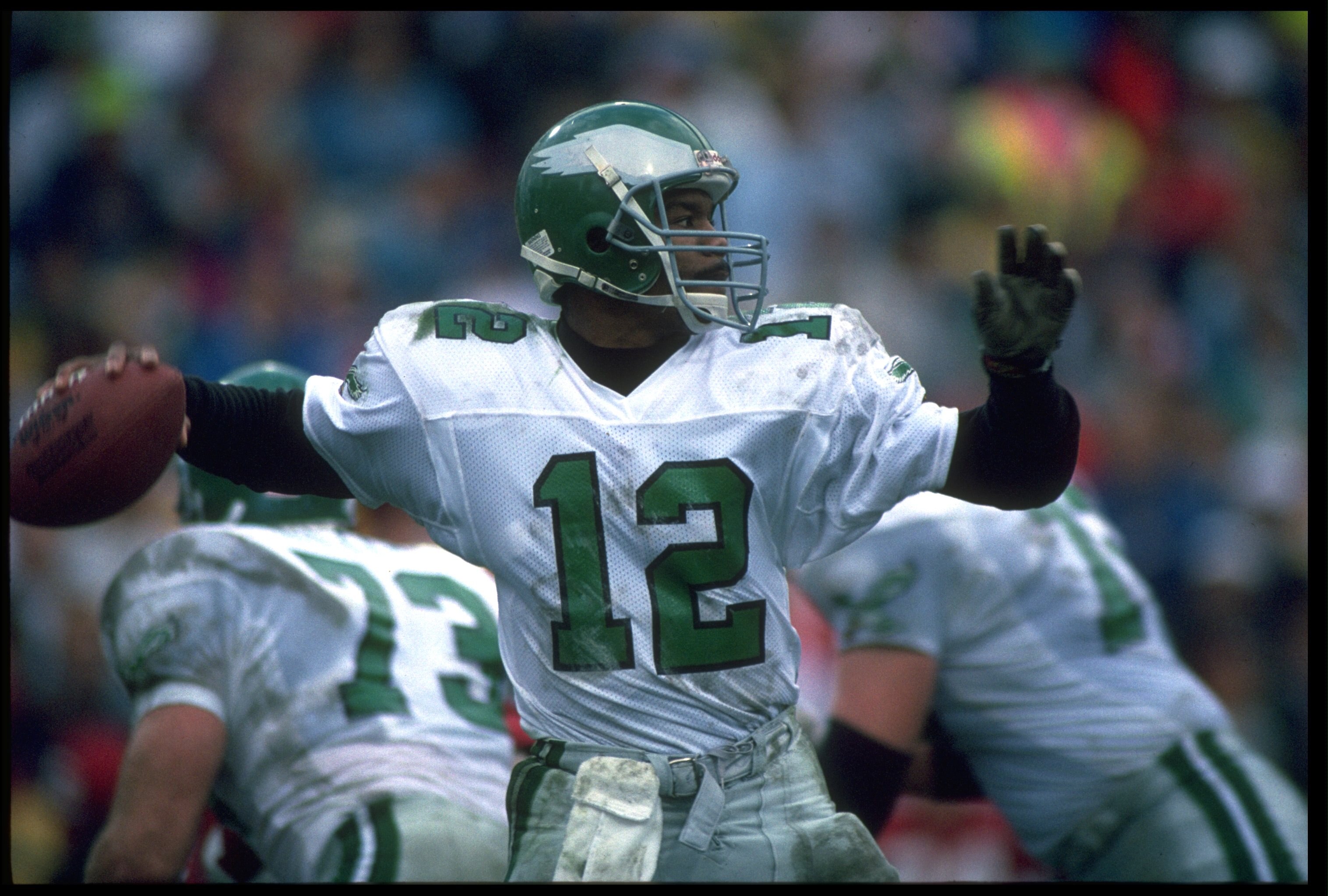 22 DEC 1990:  PHILADELPHIA EAGLES QUARTERBACK RANDALL CUNNINGHAM LOOKS TO PASS DOWNFIELD DURING THE EAGLES 23-21 VICTORY OVER THE PHOENIX CARDINALS AT SUN DEVIL STADIUM IN TEMPE, ARIZONA.