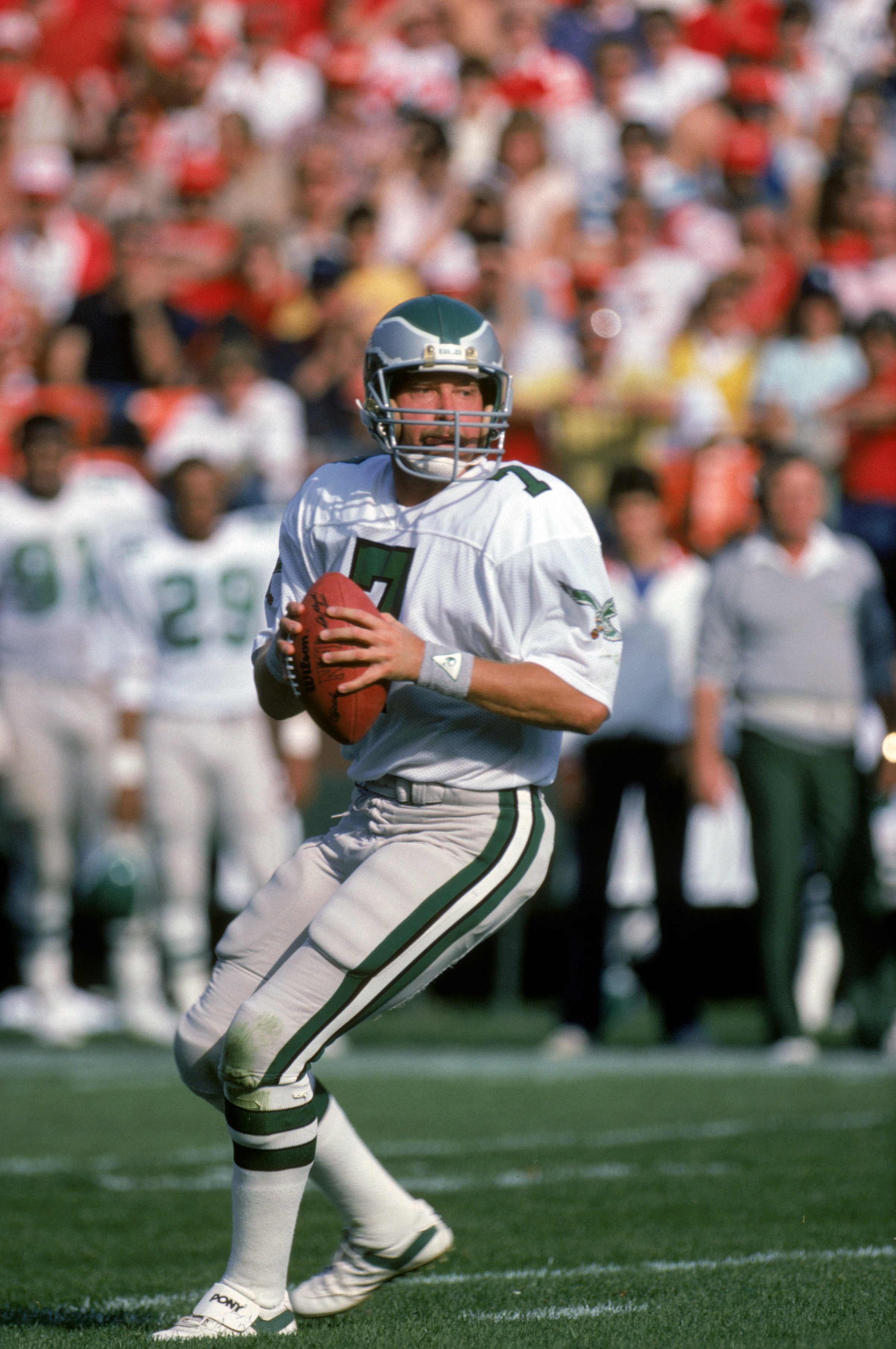 SAN FRANCISCO - NOVEMBER 3:  Quarterback Ron Jaworski #7 of the Philadelphia Eagles looks down field for a receiver during a game against the San Francisco 49ers at Candlestick Park on November 3, 1985 in San Francisco, California.  The 49ers won 24-13.