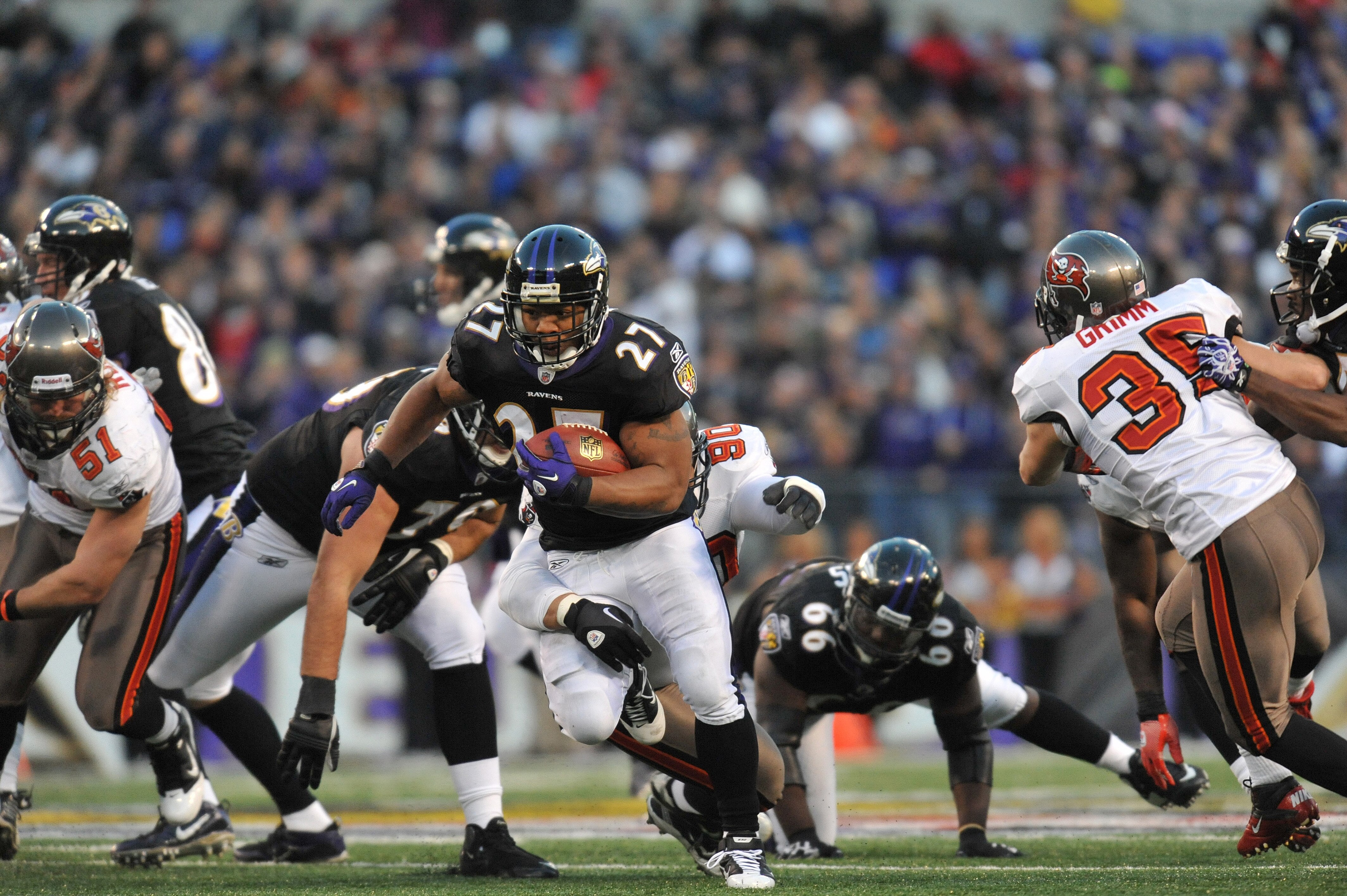 BALTIMORE, MD - NOVEMBER 28:  Ray Rice #27 of the Baltimore Ravens runs the ball against the Tampa Bay Buccaneers at M&T Bank Stadium on November 28, 2010 in Baltimore, Maryland. The Ravens defeated the Buccaneers 17-10. (Photo by Larry French/Getty Image