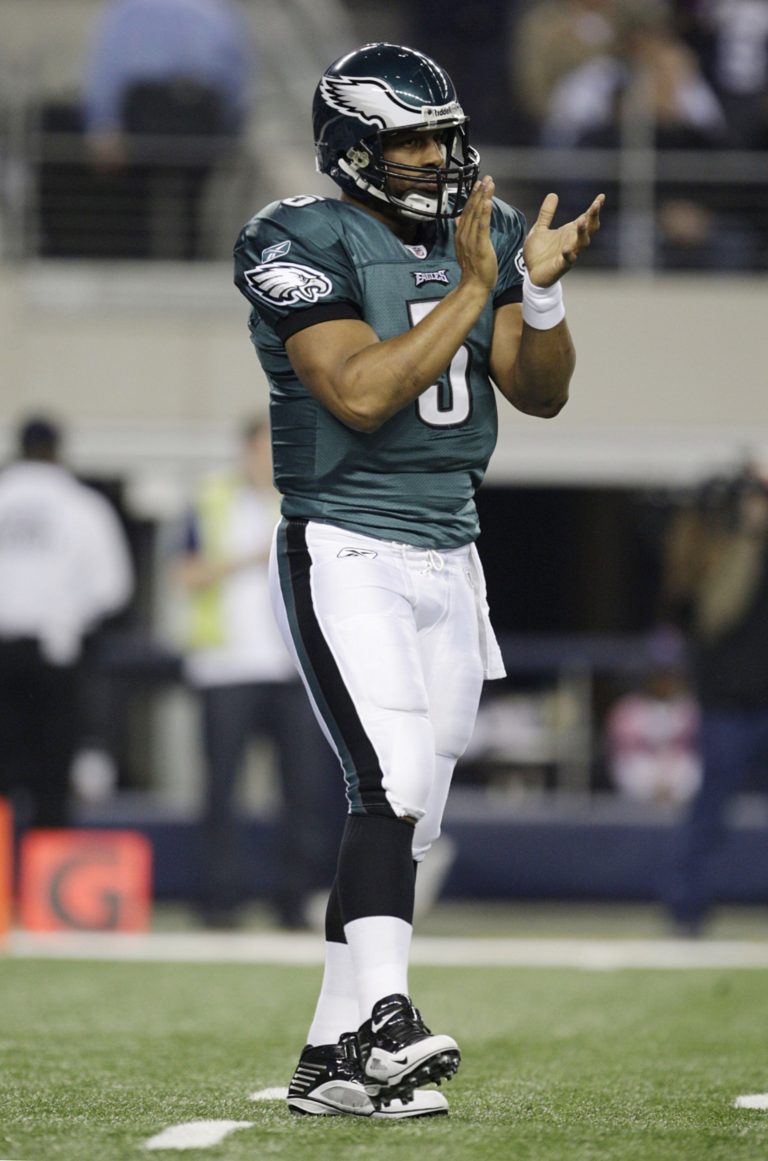 ARLINGTON, TX - JANUARY 9:  Quarterback Donovan McNabb #5 of the Philadelphia Eagles reacts in the first quarter against the Dallas Cowboys during the 2010 NFC wild-card playoff game at Cowboys Stadium on January 9, 2010 in Arlington, Texas. (Photo by Jam