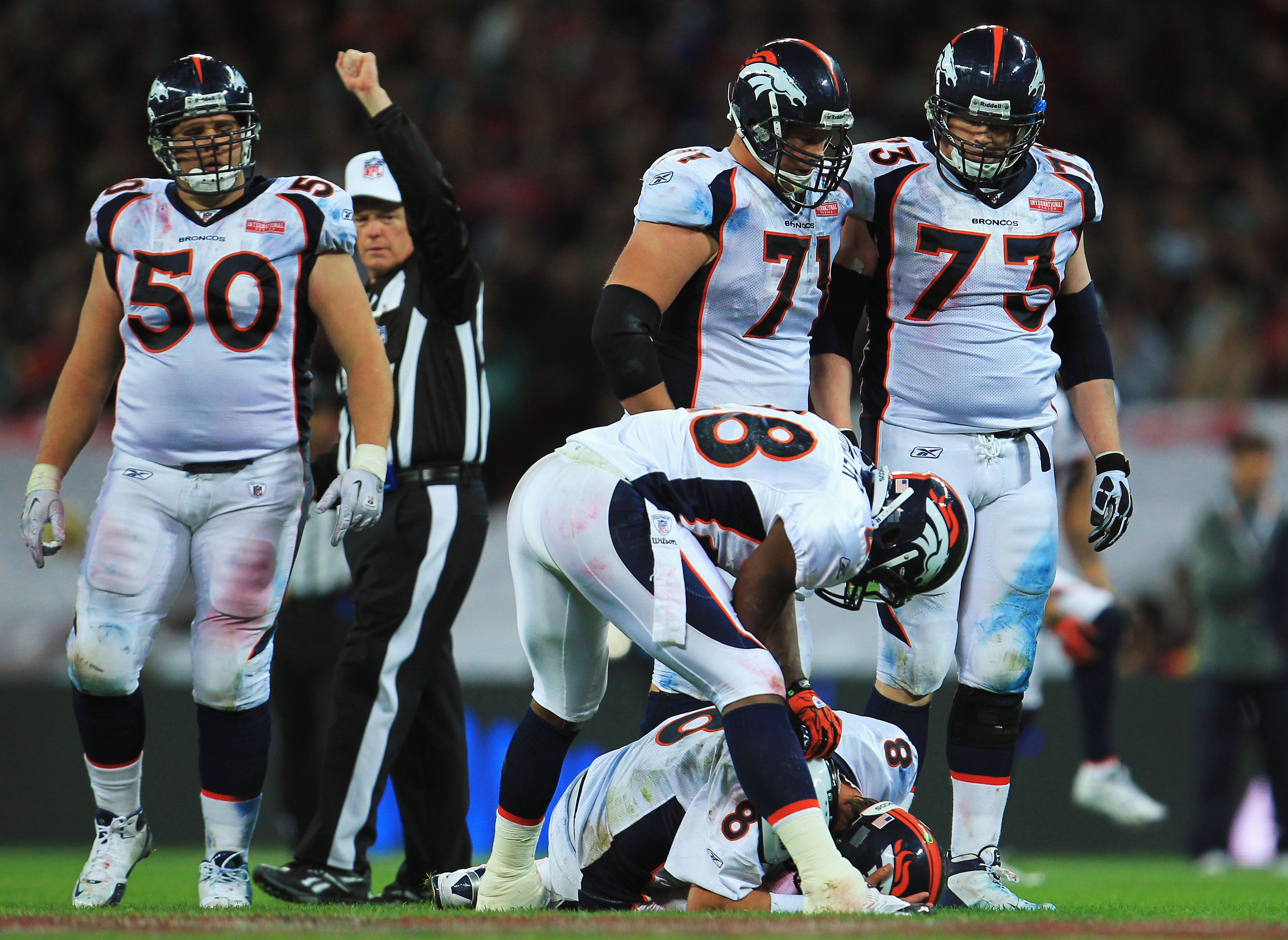 LONDON, ENGLAND - OCTOBER 31:  Kyle Orton #8 of Denver Broncos is injured following a tackle during the NFL International Series match between Denver Broncos and San Francisco 49ers at Wembley Stadium on October 31, 2010 in London, England. This is the fo