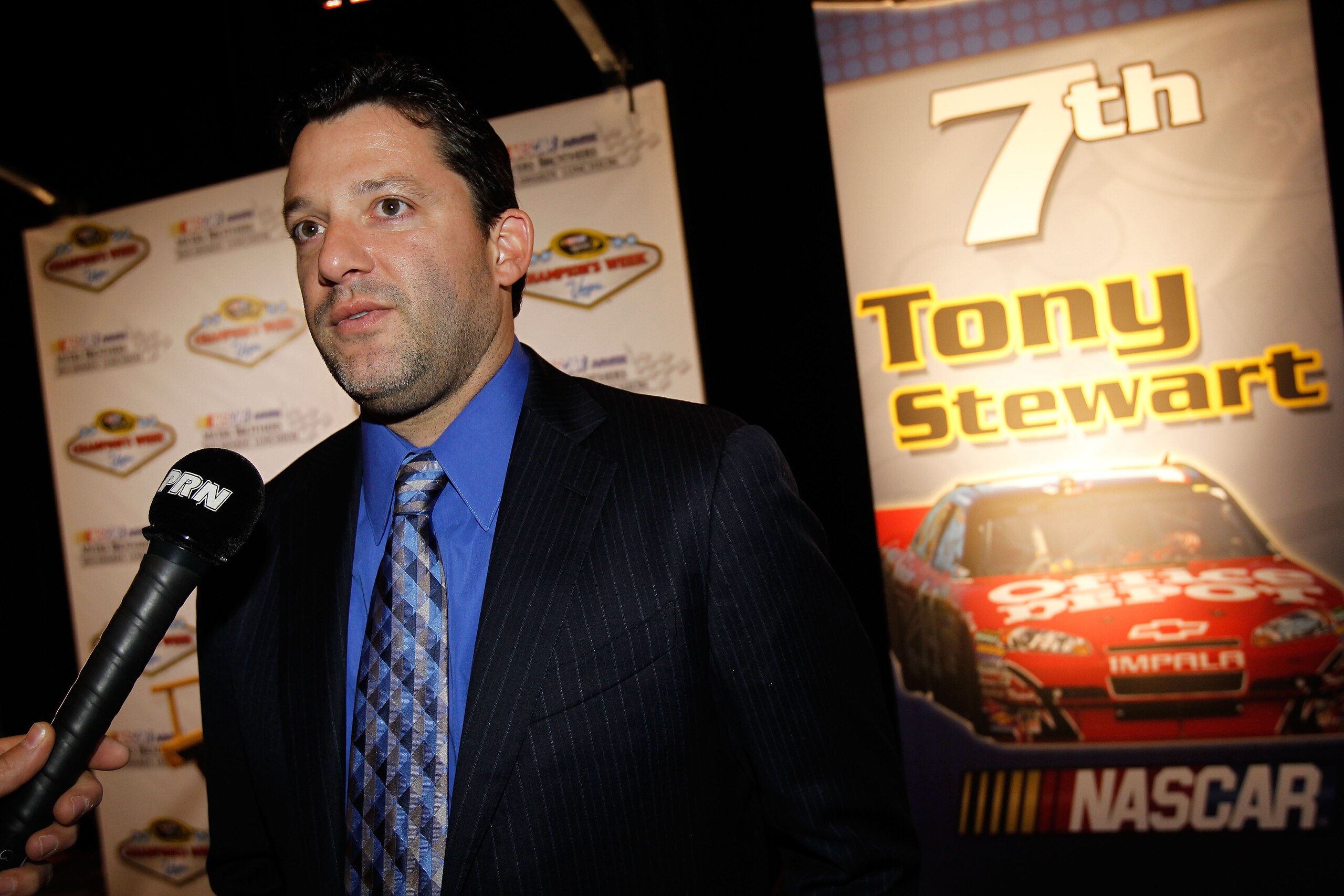 LAS VEGAS, NV - DECEMBER 02:  Tony Stewart, driver of the #14 Old Spice/Office Depot Chevrolet, speaks to the media after the NASCAR Sprint Cup Series Champions Week NMPA Myers Brothers Awards Luncheon at the Bellagio on December 2, 2010 in Las Vegas, Nev