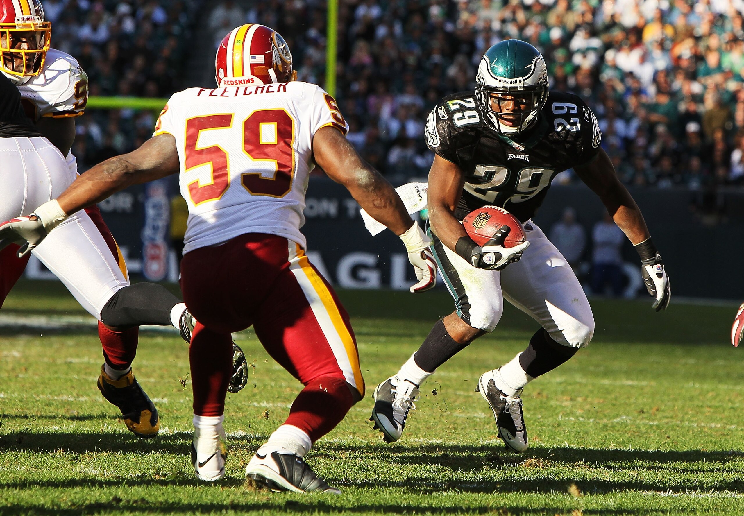 PHILADELPHIA - NOVEMBER 29:  LeSean McCoy #29 of the Philadelphia Eagles runs with the ball as London Fletcher #59  the Washington Redskins pursures during their game at Lincoln Financial Field on November 29, 2009 in Philadelphia, Pennsylvania.  (Photo b
