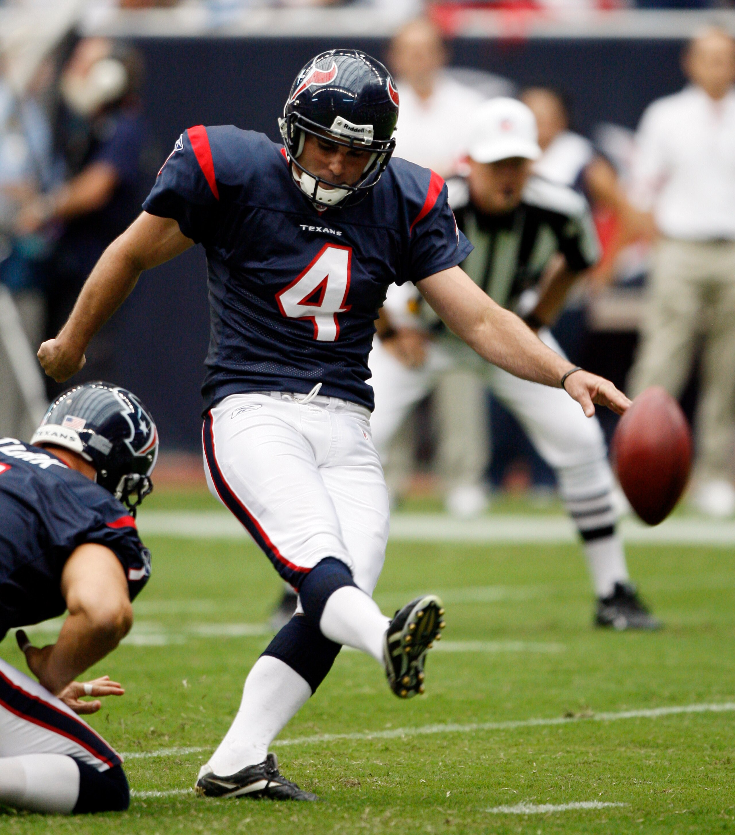 HOUSTON - SEPTEMBER 26:  Kicker Neil Rackers #4 of the Houston Texans connects on a 24 yard field goal in the second quarter against the Dallas Cowboys at Reliant Stadium on September 26, 2010 in Houston, Texas.  (Photo by Bob Levey/Getty Images)