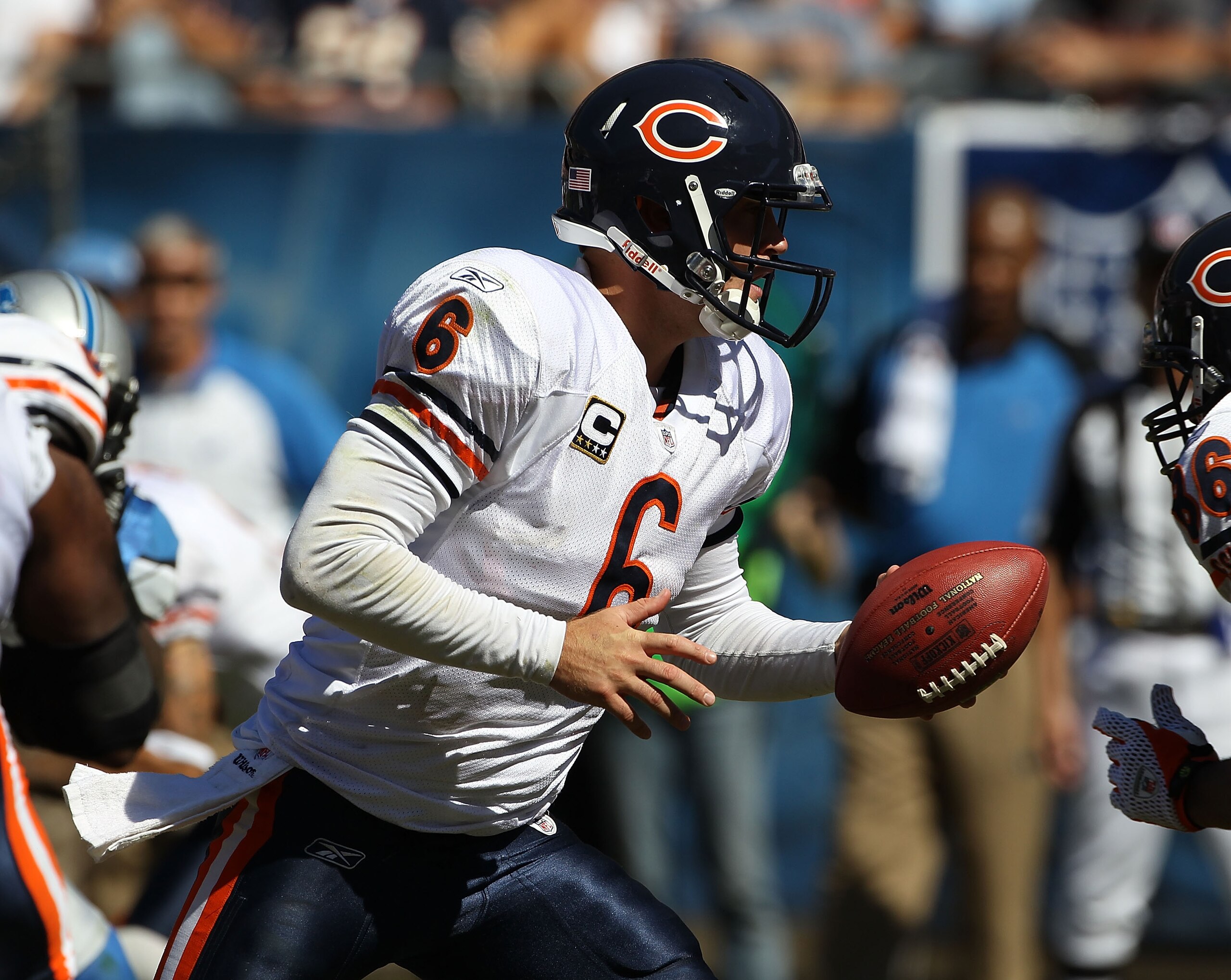 CHICAGO - SEPTEMBER 12: Jay Cutler #6 of the Chicago Bears turns to hand off against the Detroit Lions during the NFL season opening game at Soldier Field on September 12, 2010 in Chicago, Illinois. The Bears defeated the Lions 19-14. (Photo by Jonathan D