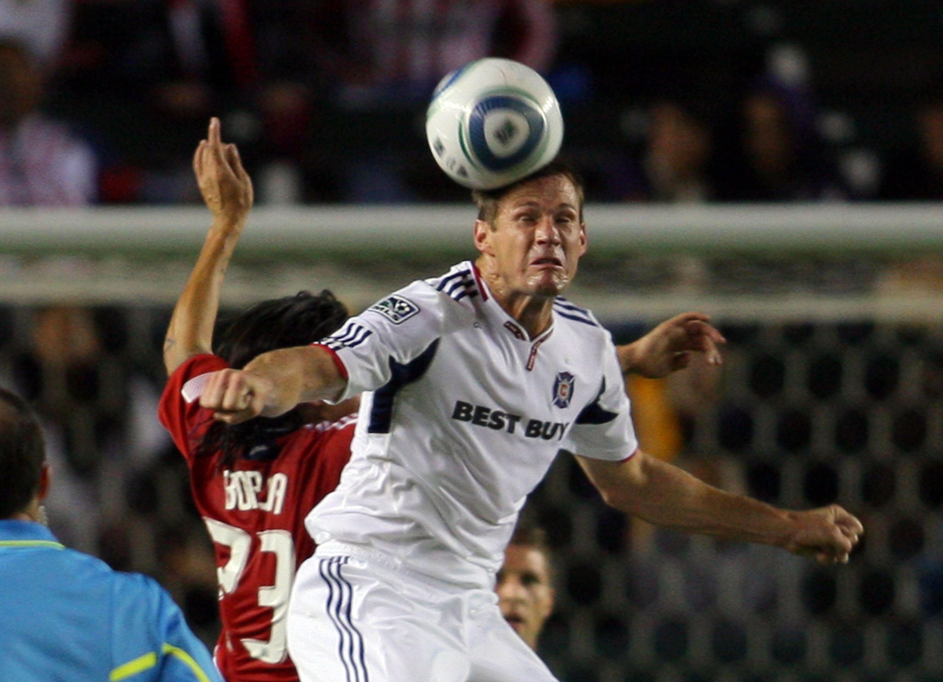 CARSON, CA - OCTOBER 23:  Brian McBride #20 of the Chicago Fire wins a high ball from Carlos Borja #23 of Chivas USA during the MLS match on October 23, 2010 at the Home Depot Center in Carson, California. The Fire defeated Chivas USA 4-1. (Photo by Victo
