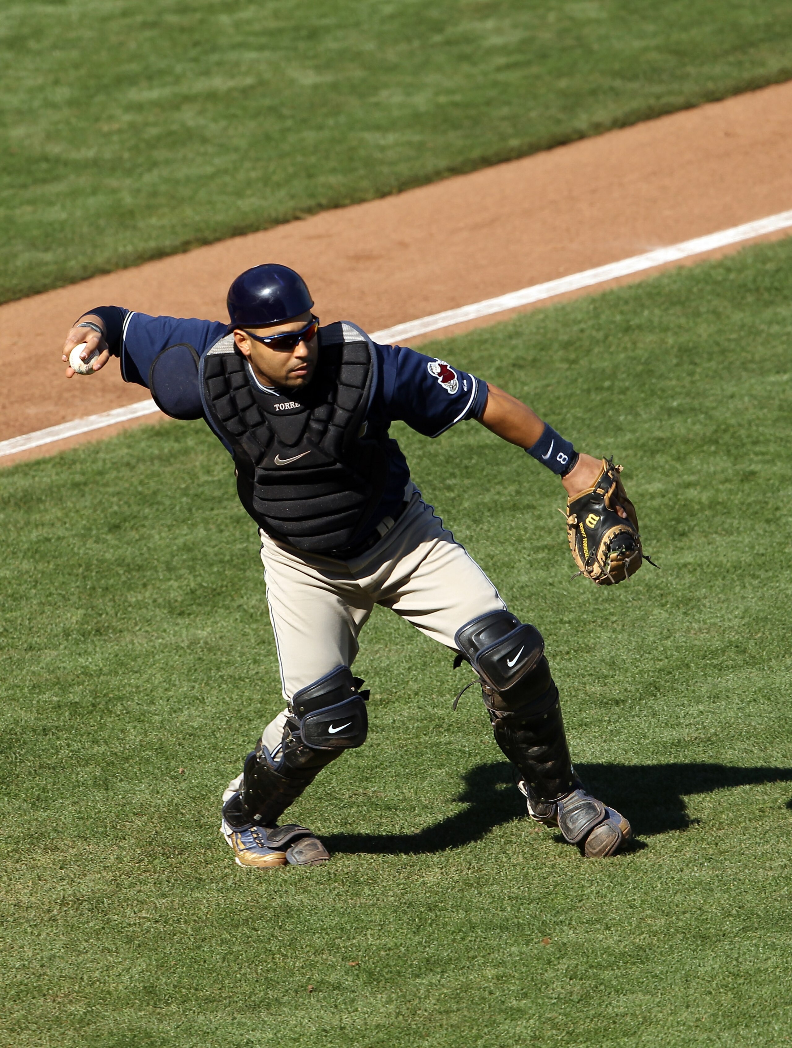 SAN FRANCISCO - OCTOBER 02:  Yorvit Torrealba #8 of the San Diego Padres in action against the San Francisco Giants at AT&T Park on October 2, 2010 in San Francisco, California.  (Photo by Ezra Shaw/Getty Images)