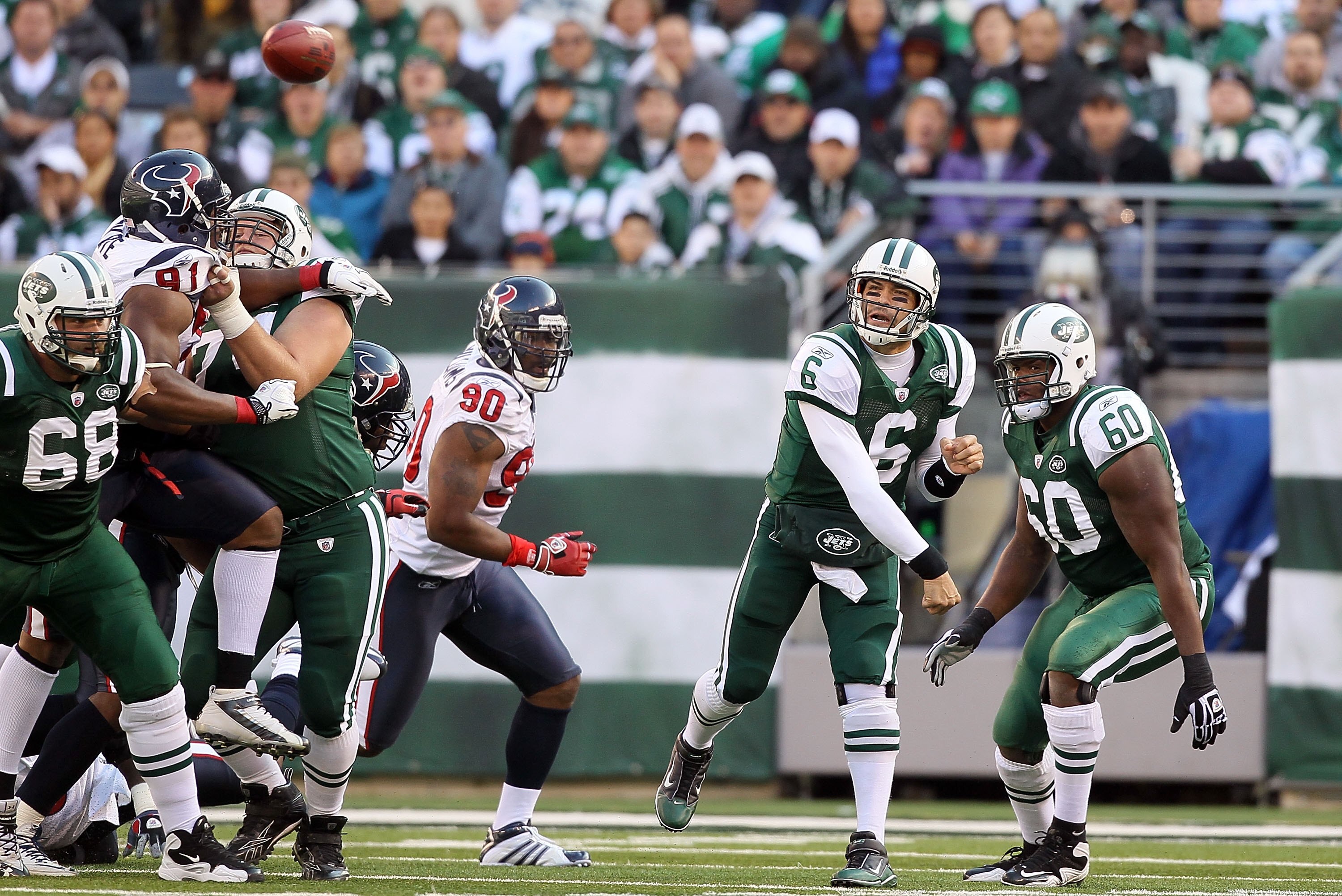 EAST RUTHERFORD, NJ - NOVEMBER 21:  Mark Sanchez #6 of the New York Jets in action against the Houston Texans on November 21, 2010 at the New Meadowlands Stadium in East Rutherford, New Jersey.  (Photo by Jim McIsaac/Getty Images)