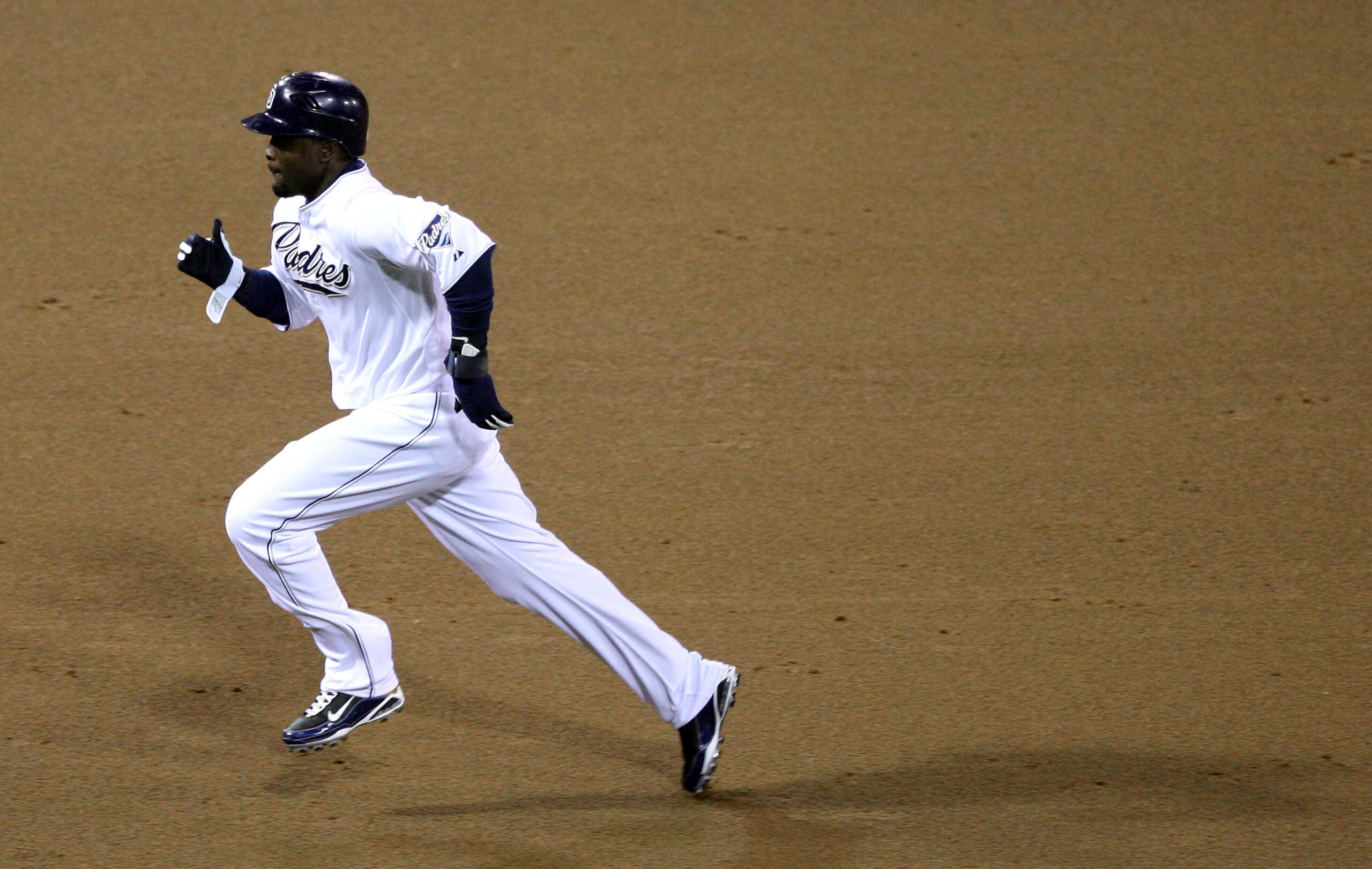 SAN DIEGO, CA - SEPTEMBER 24:  Tony Gwynn #18 of the San Diego Padres pinch runs to score against the Cincinnati Reds during their MLB game on September 24, 2010 at PETCO Park in San Diego, California. (Photo by Donald Miralle/Getty Images)