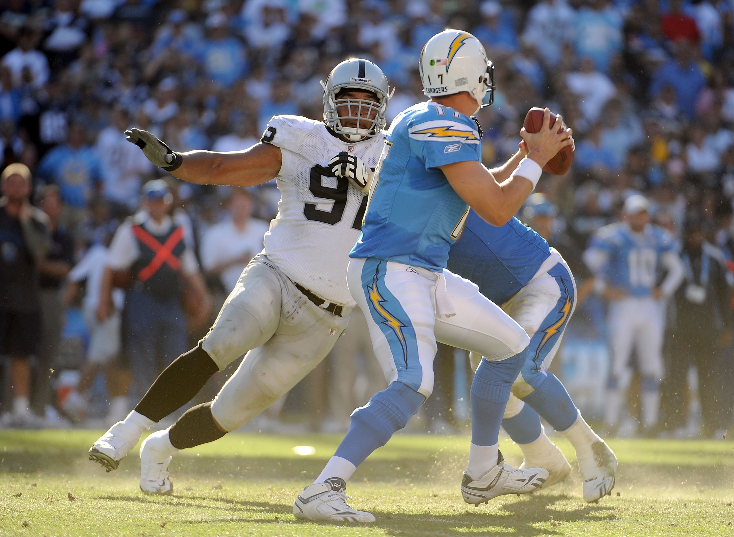 SAN DIEGO - NOVEMBER 01:  Richard Seymour #92 of the Oakland Raiders rushes Philip Rivers #17 of the San Diego Chargers during the game at Qualcomm Stadium on November 1, 2009 in San Diego California. The Chargers defeated the Raiders 24-16. (Photo by Har