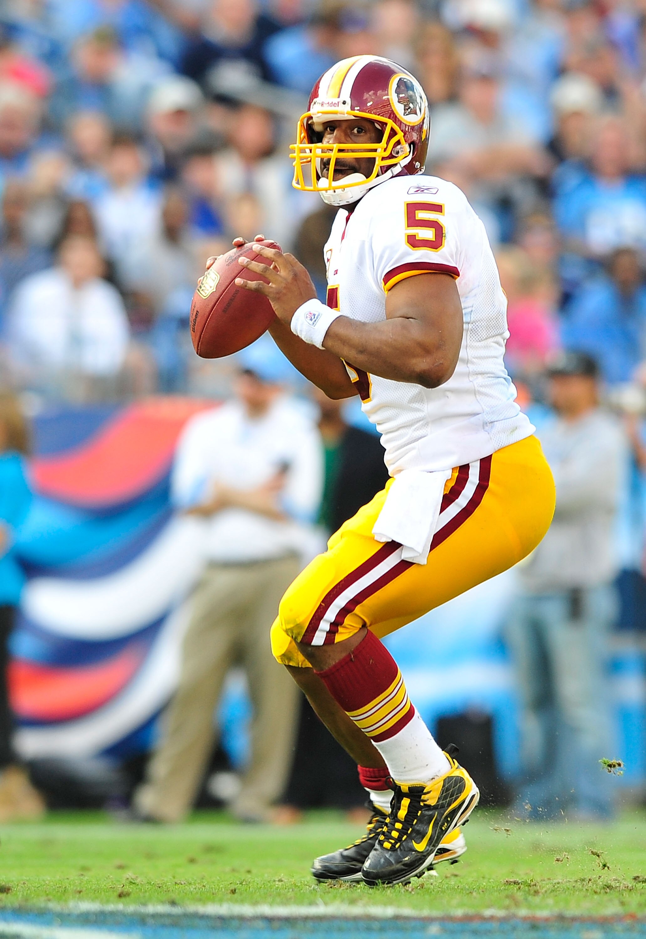 NASHVILLE, TN - NOVEMBER 21:  Quarterback Donovan McNabb #5 of the Washington Redskins drops back to pass against the Tennessee Titans at LP Field on November 21, 2010 in Nashville, Tennessee. The Redskins won 19-16 in overtime.  (Photo by Grant Halverson