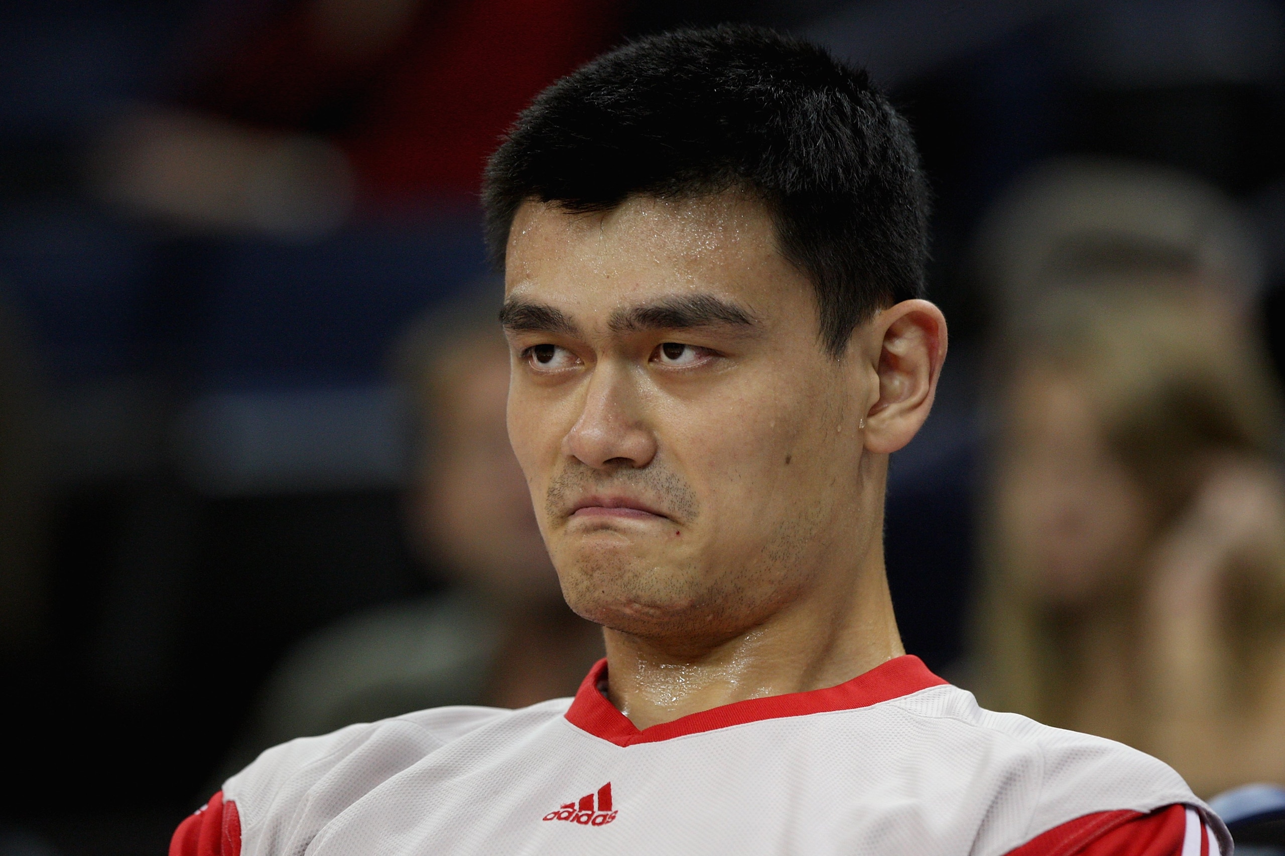 OAKLAND, CA - DECEMBER 12:  Yao Ming #11 of the Houston Rockets sits on the bench during the game against the Golden State Warriors on December 12, 2008 at Oracle Arena in Oakland, California.  The Rockets won 119-108.  NOTE TO USER: User expressly acknow