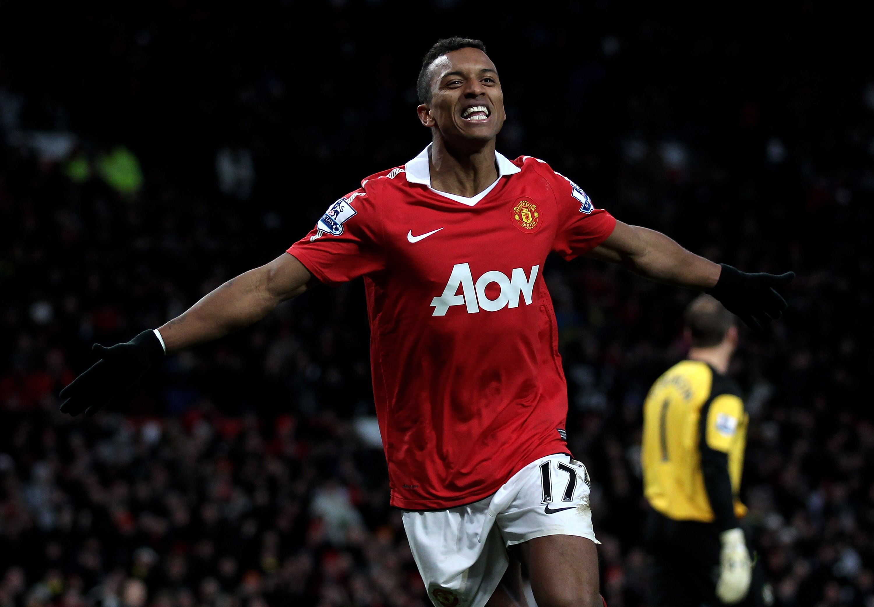 MANCHESTER, ENGLAND - NOVEMBER 27:  Nani of Manchester United celebrates scoring his team's fifth goal during the Barclays Premier League match between Manchester United and Blackburn Rovers at Old Trafford on November 27, 2010 in Manchester, England.  (P
