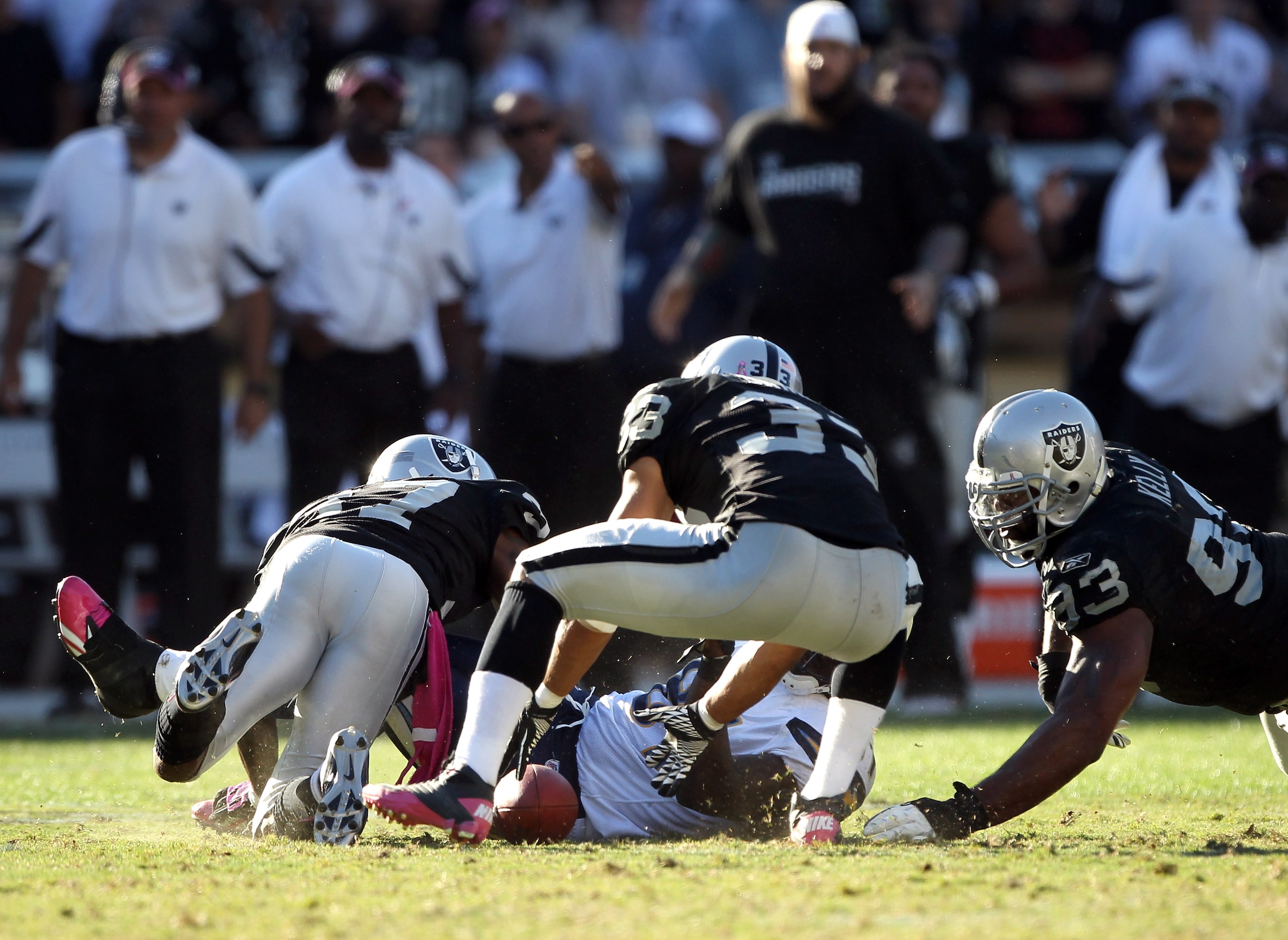 OAKLAND, CA - OCTOBER 10: Tyvon Branch #33 of the Oakland Raiders picks up a fumble and returned it for a touchdwon in the fourth quarter of their game against the San Diego Chargers at Oakland-Alameda County Coliseum on October 10, 2010 in Oakland, Cali OAKLAND, CA - OCTOBER 10: Tyvon Branch #33 of the Oakland Raiders picks up a fumble and returned it for a touchdwon in the fourth quarter of their game against the San Diego Chargers at Oakland-Alameda County Coliseum on October 10, 2010 in Oakland, Cali