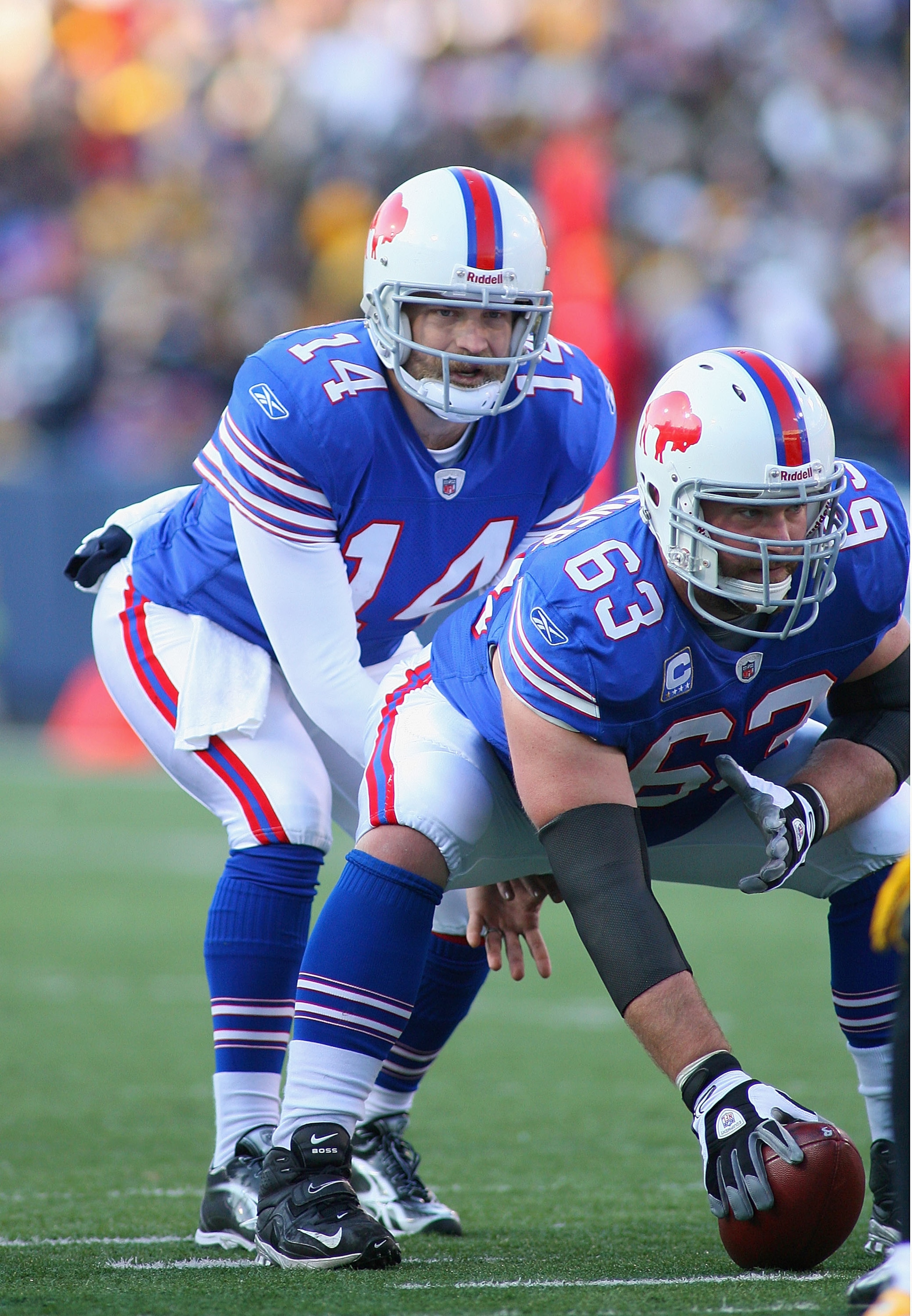 ORCHARD PARK, NY - NOVEMBER 28:  Ryan Fitzpatrick #14  of the Buffalo Bills readies to take the snap from Geoff Hangartner #63 against the Pittsburgh Steelers at Ralph Wilson Stadium on November 28, 2010 in Orchard Park, New York. Pittsburgh won 19-16 in