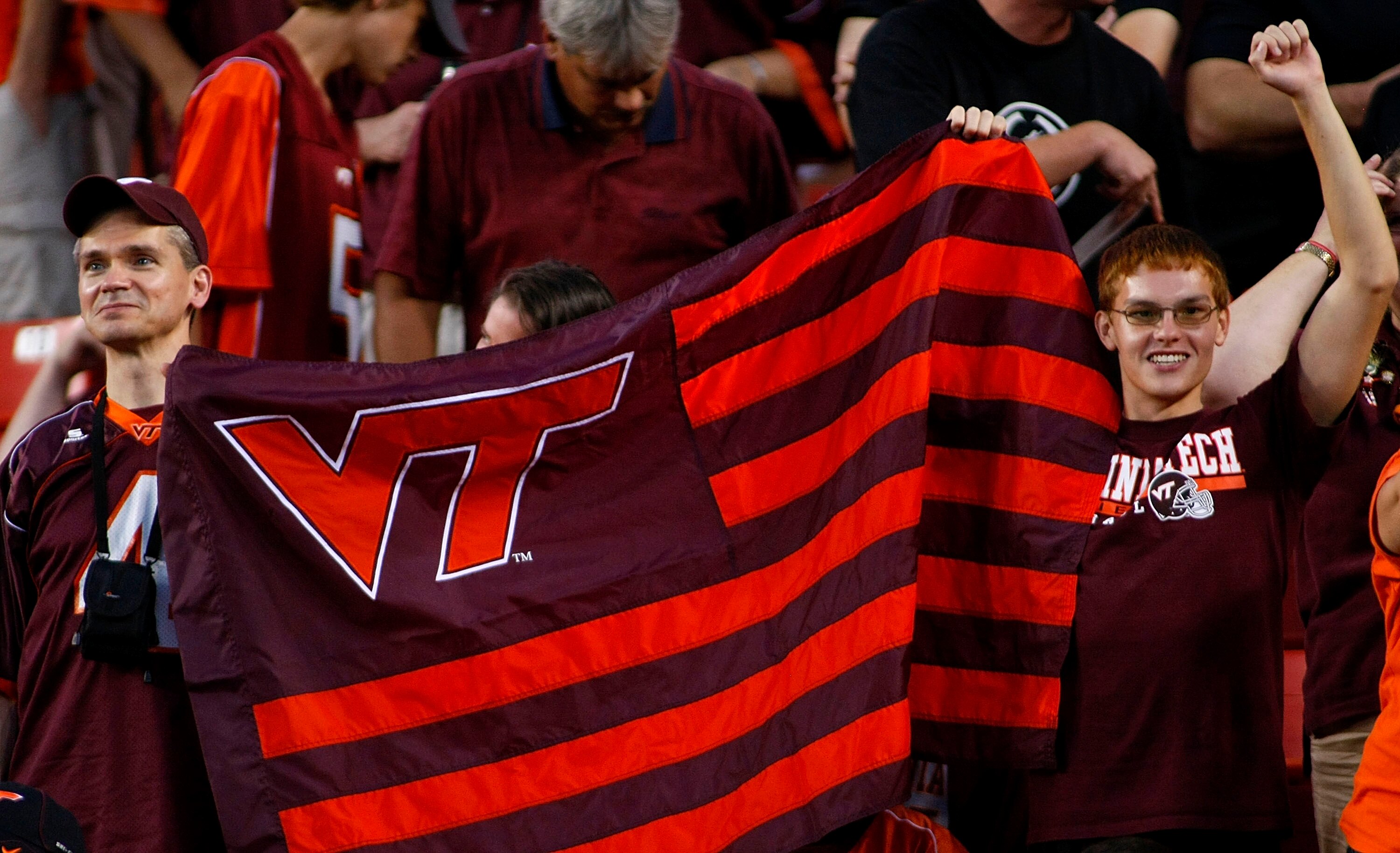 LANDOVER, MD - SEPTEMBER 06:  Virginia Tech Hokies fans cheer against the Boise State Broncos at FedExField on September 6, 2010 in Landover, Maryland.  (Photo by Geoff Burke/Getty Images)
