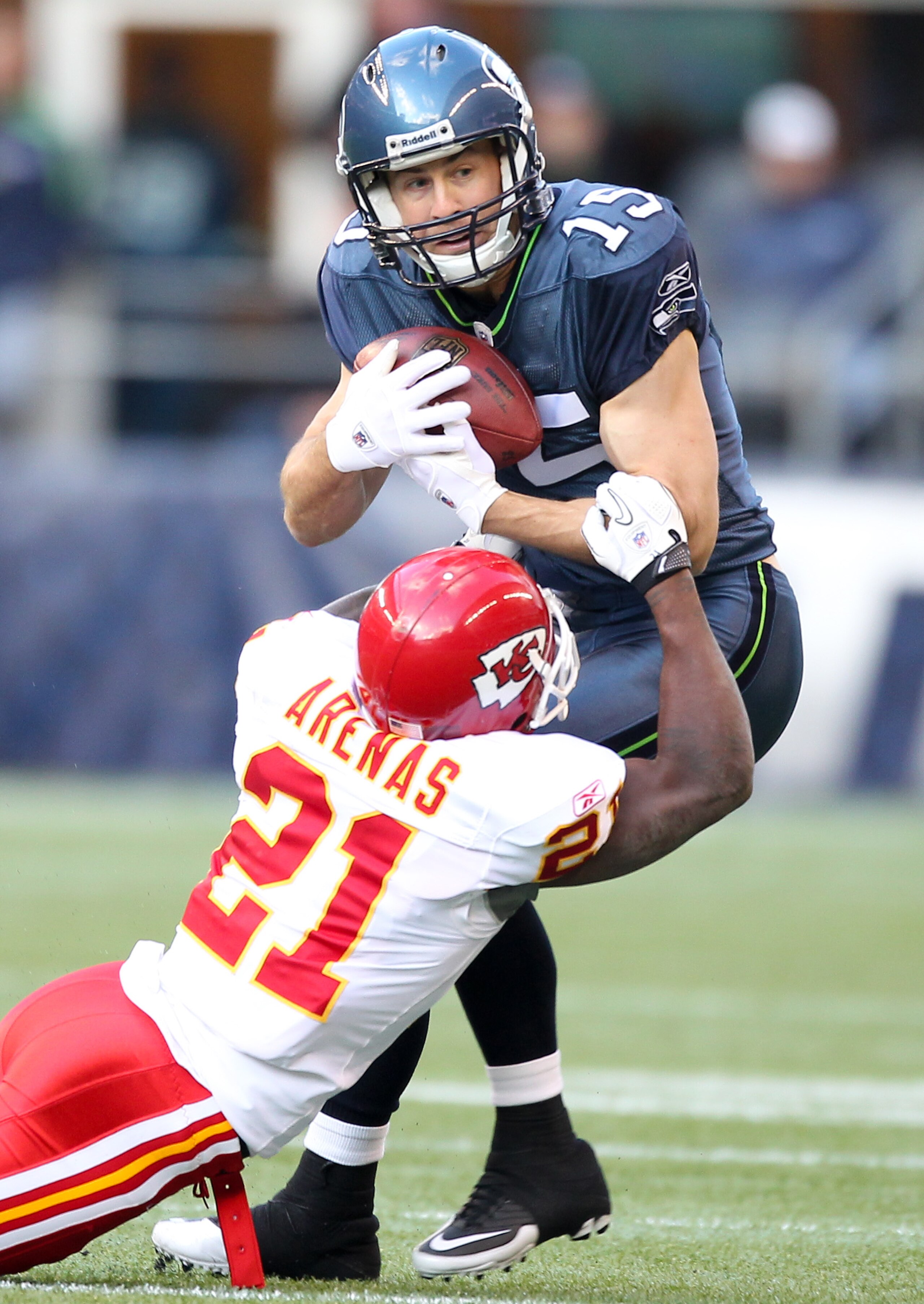 SEATTLE, WA - NOVEMBER 28:  Wide receiver Brandon Stokley #15 of the Seattle Seahawks is tackled by Javier Arenas #21 of the Kansas City Chiefs at Qwest Field on November 28, 2010 in Seattle, Washington. (Photo by Otto Greule Jr/Getty Images)