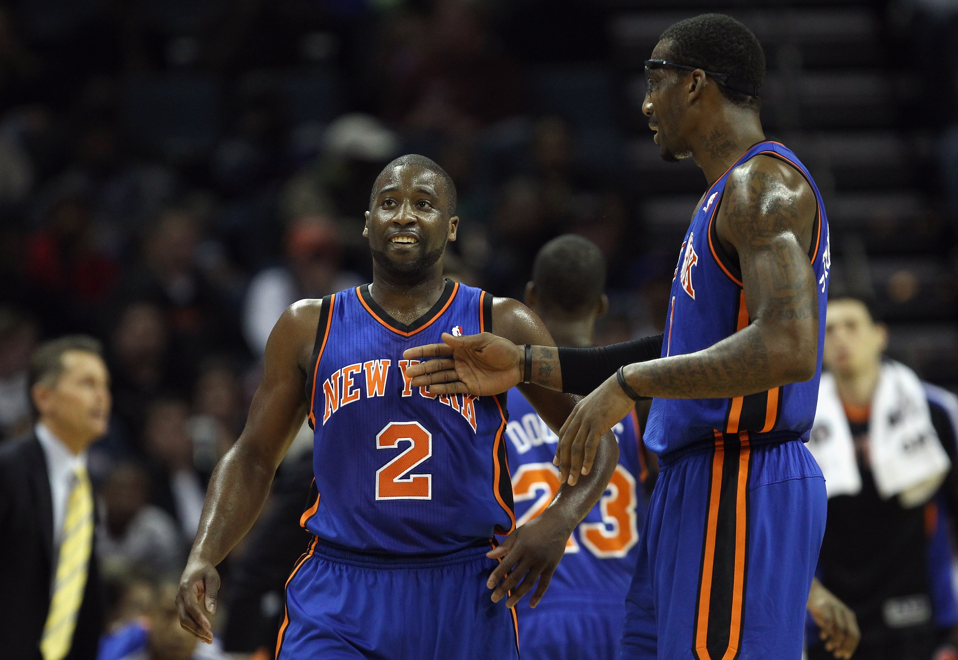 CHARLOTTE, NC - NOVEMBER 24:  Amare Stoudemire #1 of the New York Knicks and teammate Raymond Felton #2 react to a call during their game against the Charlotte Bobcats at Time Warner Cable Arena on November 24, 2010 in Charlotte, North Carolina.  NOTE TO 