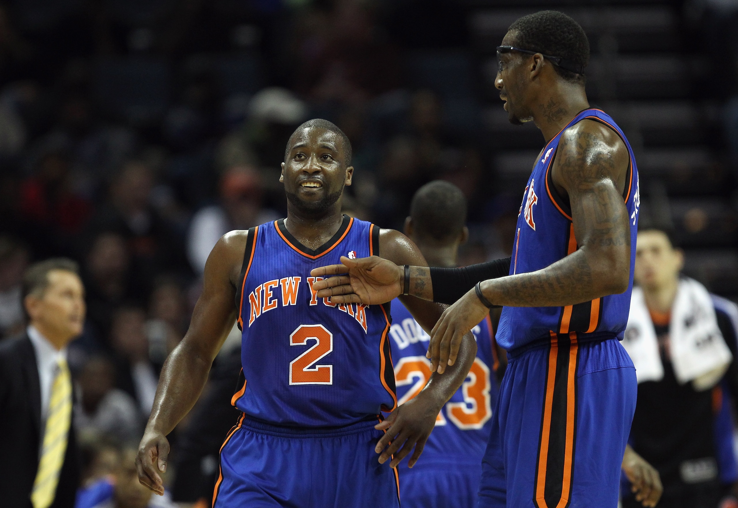 CHARLOTTE, NC - NOVEMBER 24:  Amare Stoudemire #1 of the New York Knicks and teammate Raymond Felton #2 react to a call during their game against the Charlotte Bobcats at Time Warner Cable Arena on November 24, 2010 in Charlotte, North Carolina.  NOTE TO 