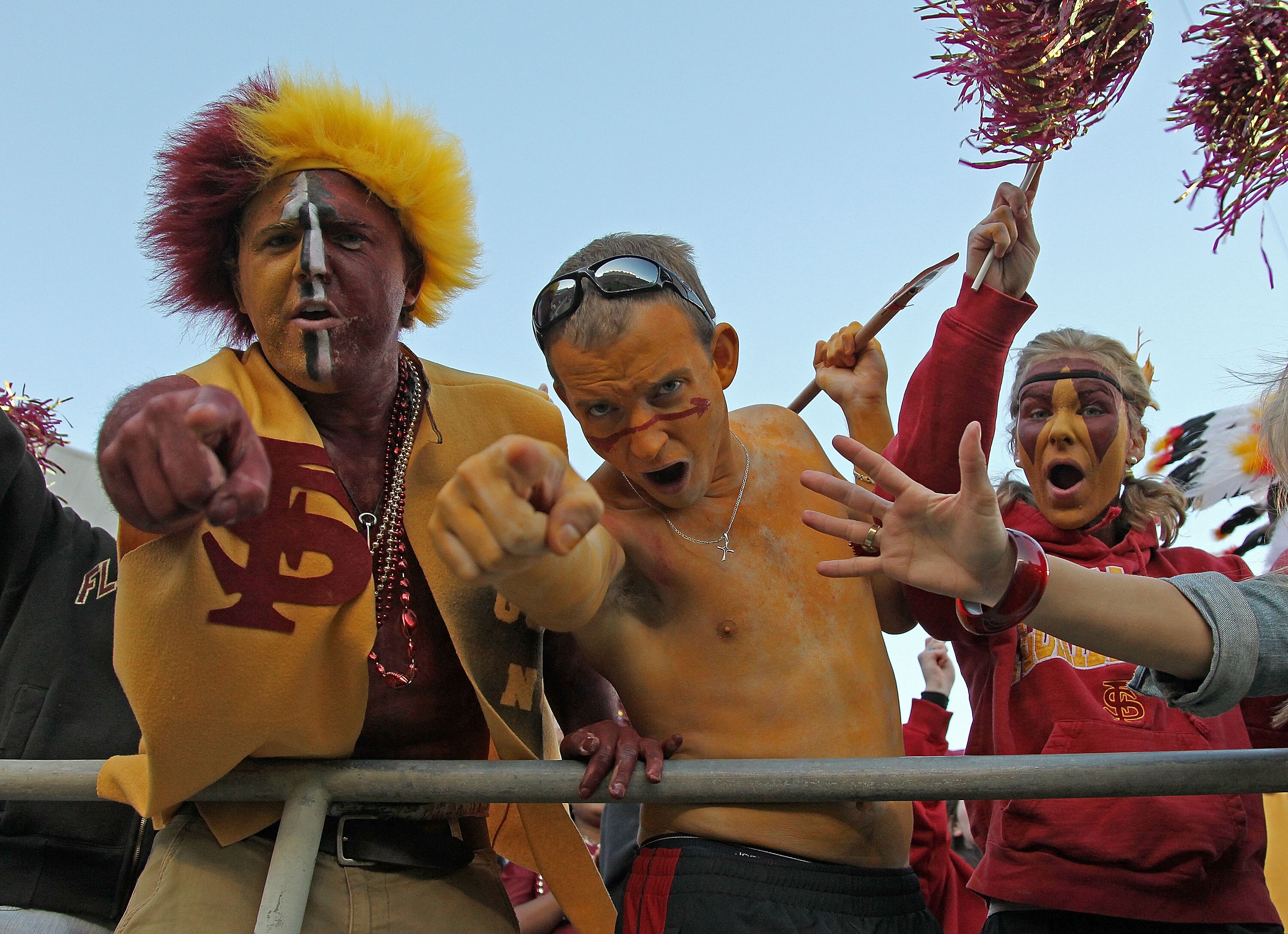 TALLAHASSEE, FL - NOVEMBER 27:  Florida State Seminoles fans celebrate after a touchdown during a game against the Florida Gators at Doak Campbell Stadium on November 27, 2010 in Tallahassee, Florida.  (Photo by Mike Ehrmann/Getty Images)