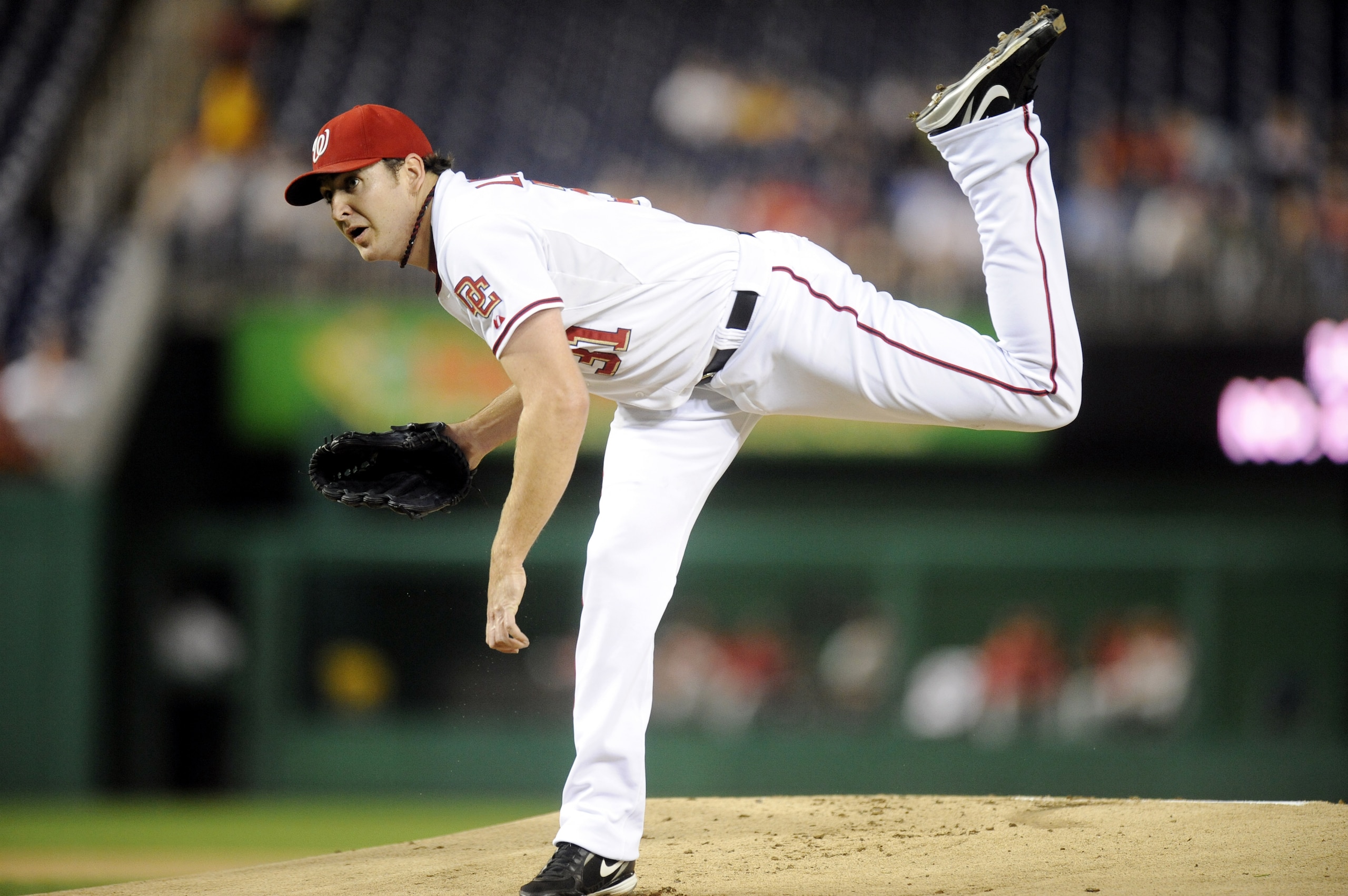 WASHINGTON - SEPTEMBER 27:  John Lannan #31 of the Washington Nationals pitches during a baseball game against the Philadelphia Phillies on September 27, 2010 at Nationals Park in Washington, D.C.    (Photo by Mitchell Layton/Getty Images)