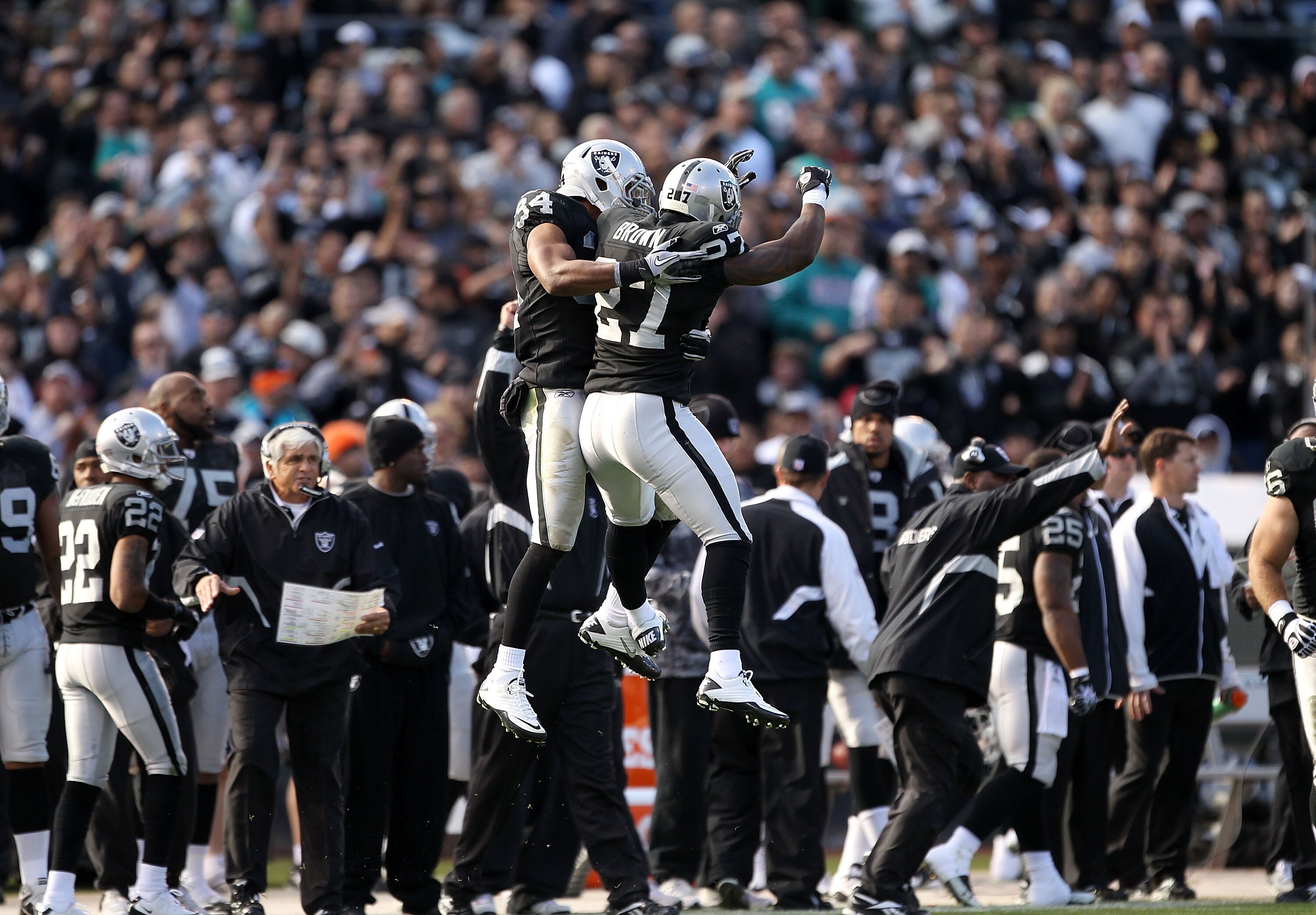 OAKLAND, CA - NOVEMBER 28:  Mike Mitchell #34 and Stevie Brown #27 of the Oakland Raiders react after a play during their game against the Miami Dolphins at Oakland-Alameda County Coliseum on November 28, 2010 in Oakland, California.  (Photo by Ezra Shaw/