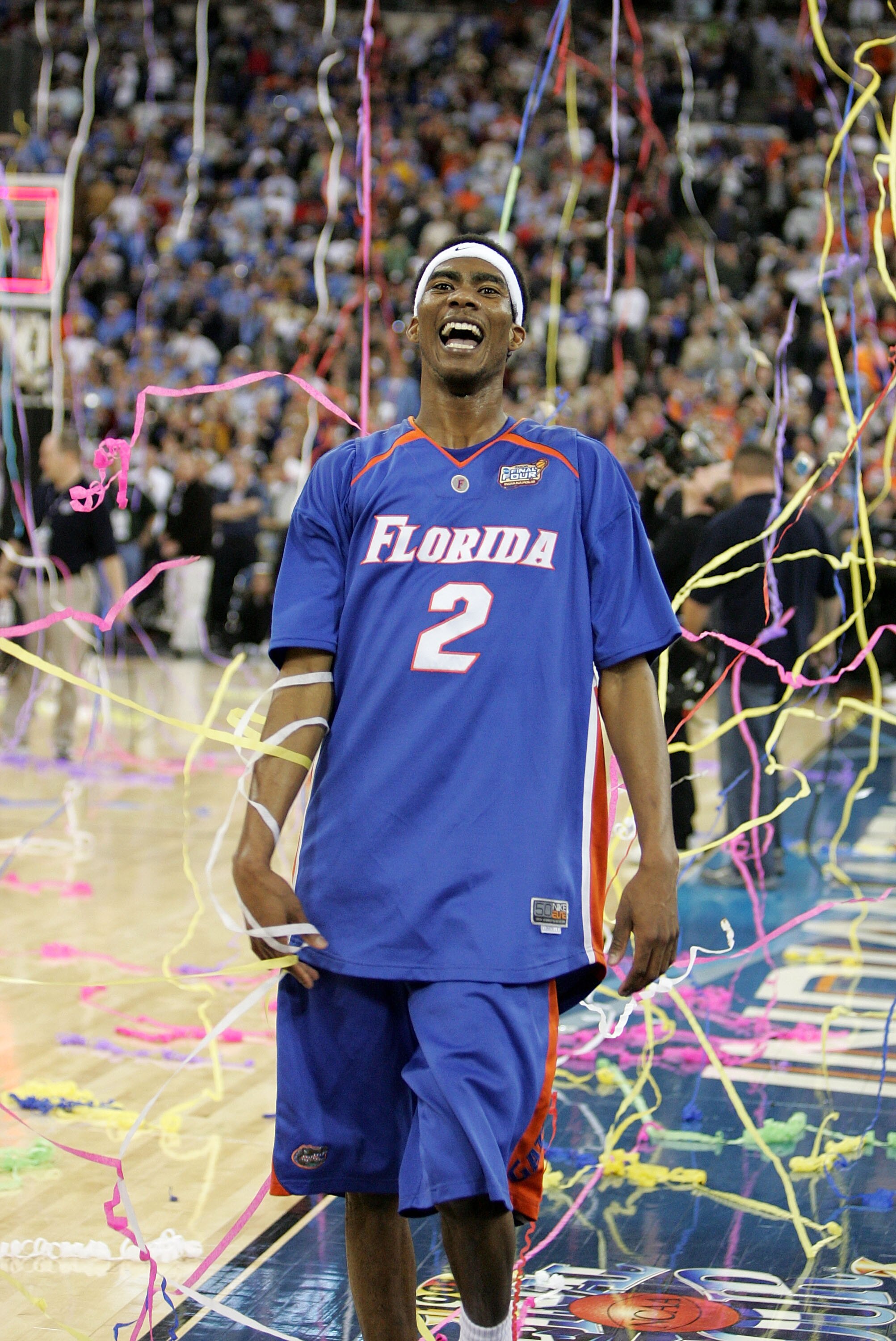 INDIANAPOLIS - APRIL 03:  Corey Brewer #2 of the Florida Gators smiles as confetti falls from the roof after the game against the UCLA Bruins during the National Championship game of the NCAA Men's Final Four on April 3, 2006 at the RCA Dome in Indianapol