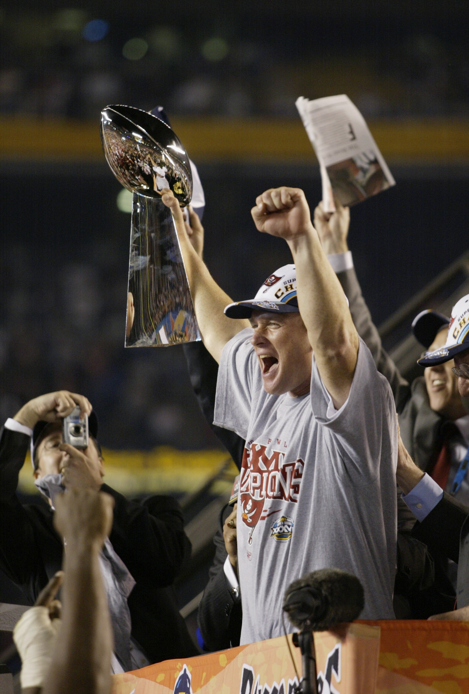 SAN DIEGO - JANUARY 26:  Head Coach Jon Gruden of the Tampa Bay Buccaneers holds up the Vince Lombardi Trophy after his team defeated the Oakland Raiders in the Super Bowl XXXVII at Qualcomm Stadium on January 26, 2003 in San Diego, California.  The Bucca