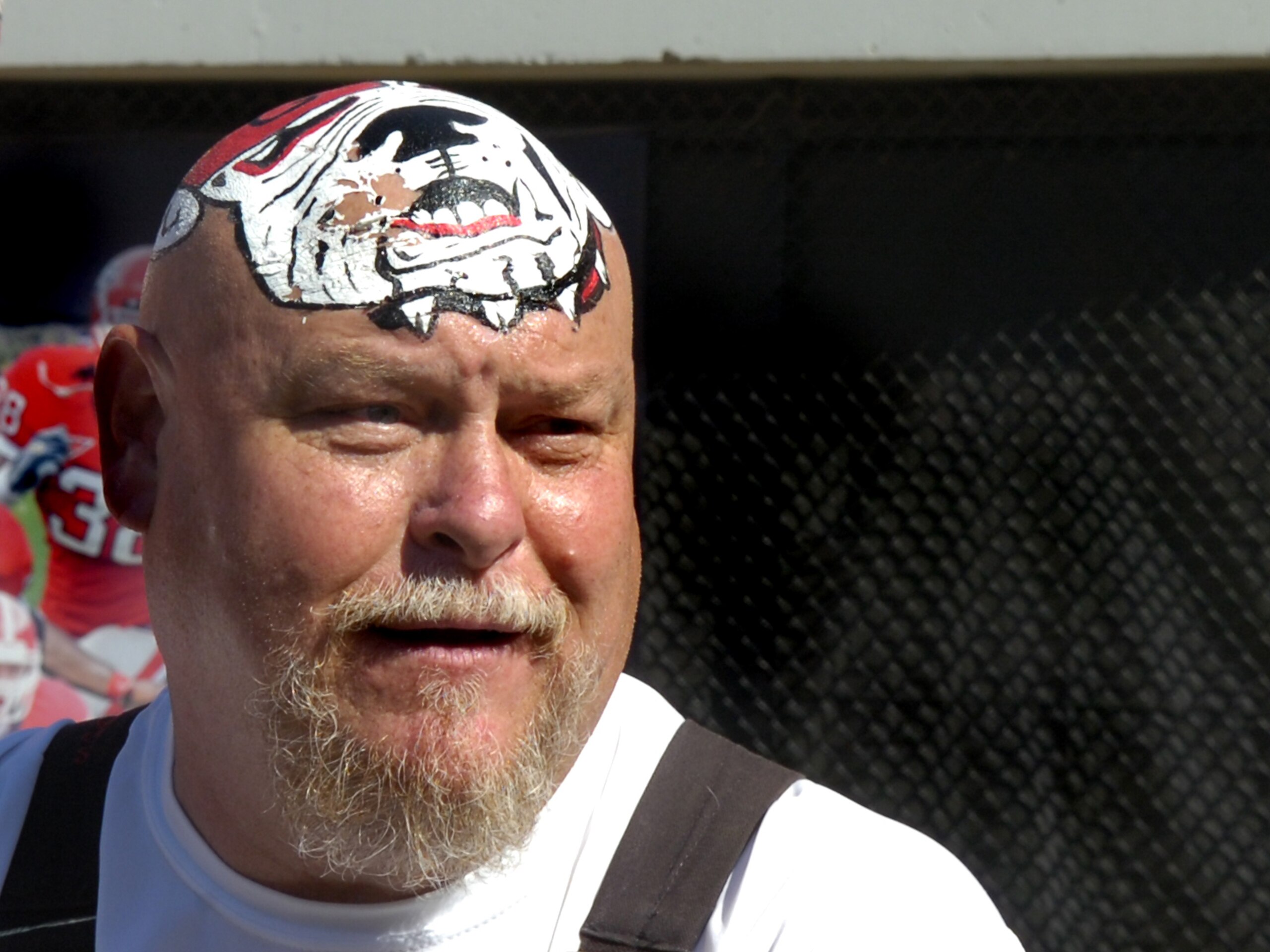 ATHENS, GA - SEPTEMBER 29: A fan of the Georgia Bulldogs watches play from an end-zone seat against the Ole Miss Rebels at Sanford Stadium on September 29, 2007 in Athens, Georgia.  Georgia won 45 - 17. (Photo by Al Messerschmidt/Getty Images)