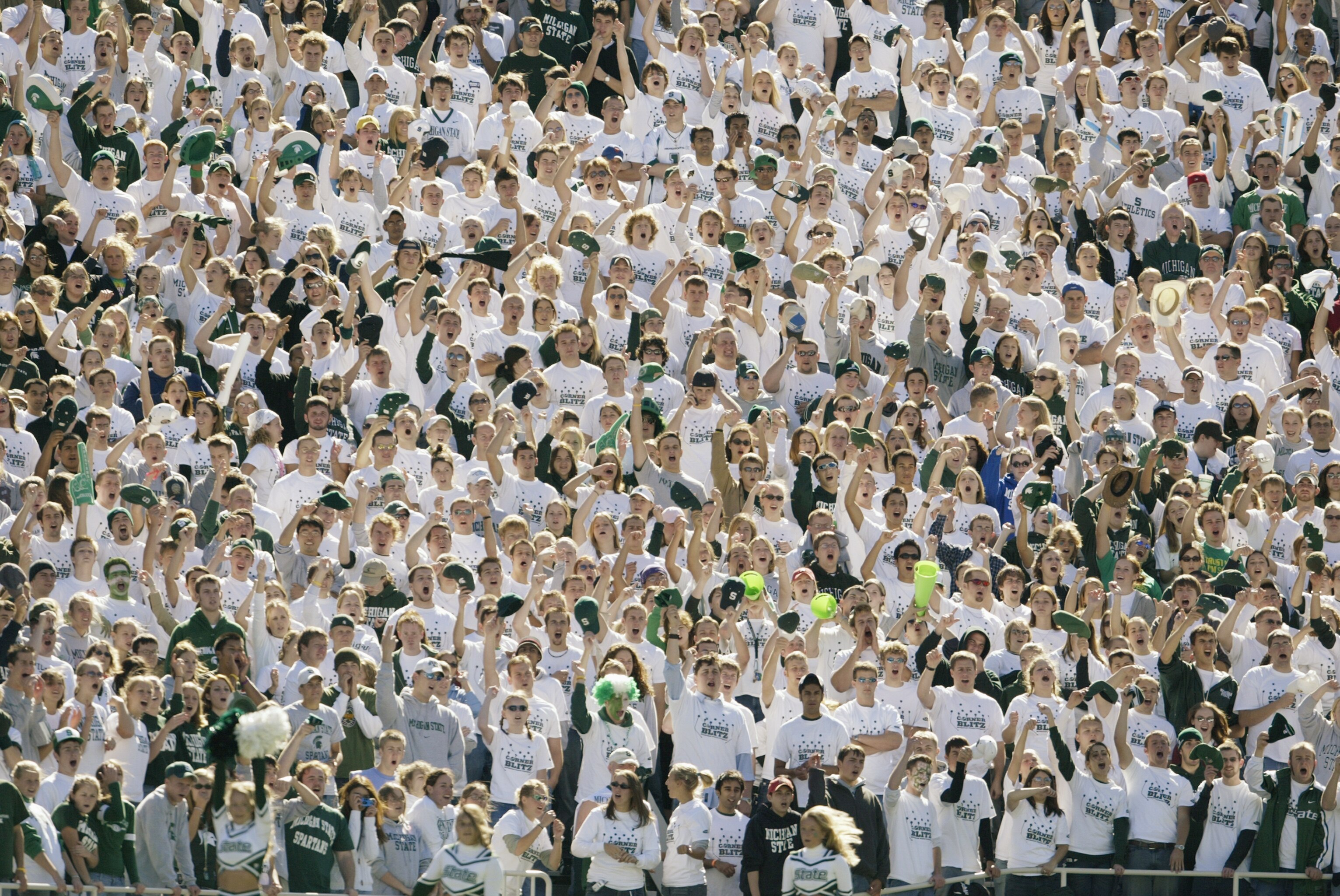 EAST LANSING, MI - OCTOBER 9:  The Michigan State University Spartans wear 'Corner Blitz' shirts during the game against the University of Illinois Fighting Illini at Spartan Stadium on October 9, 2004 in East Lansing, Michigan. Michigan State defeated Il