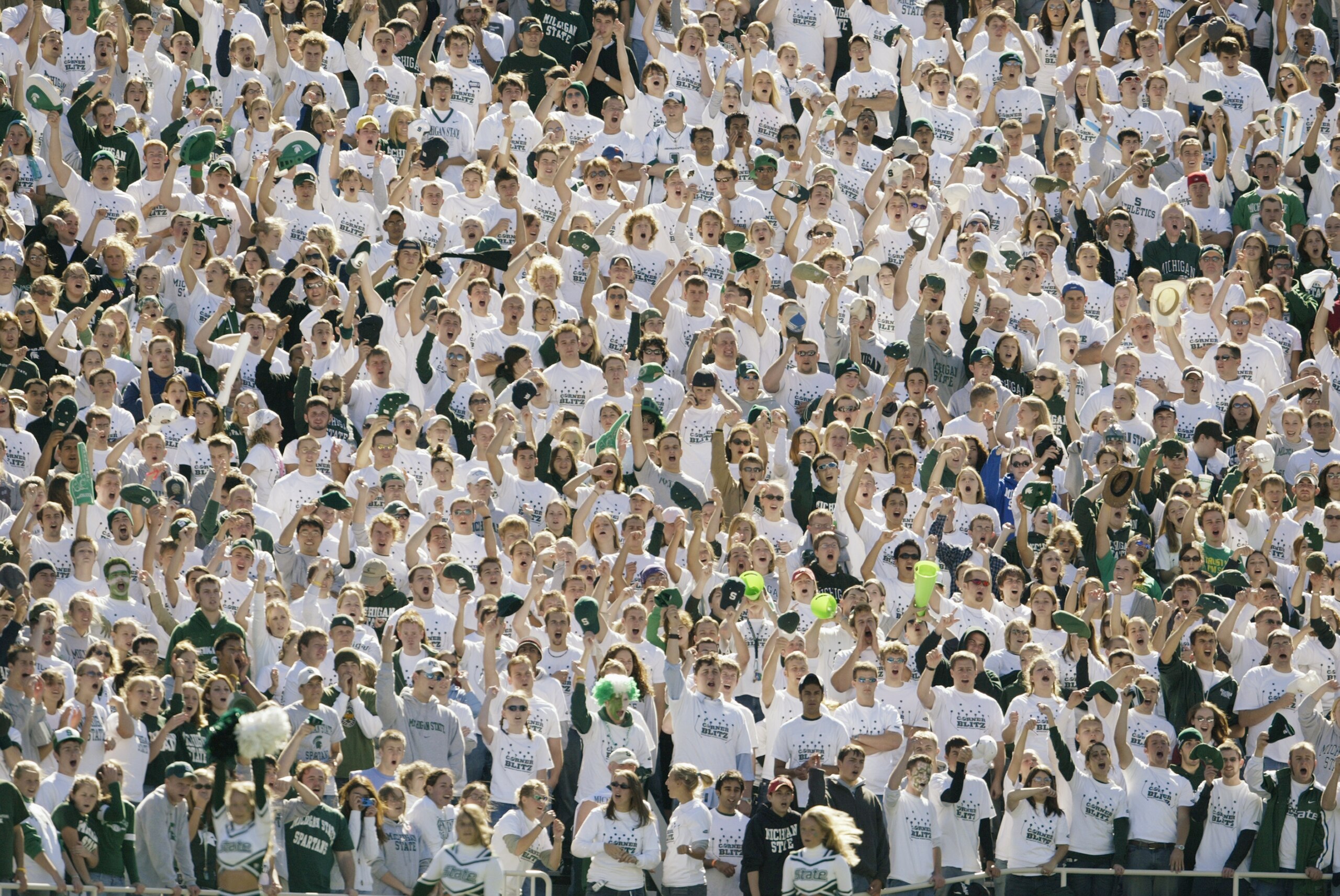 EAST LANSING, MI - OCTOBER 9:  The Michigan State University Spartans wear 'Corner Blitz' shirts during the game against the University of Illinois Fighting Illini at Spartan Stadium on October 9, 2004 in East Lansing, Michigan. Michigan State defeated Il