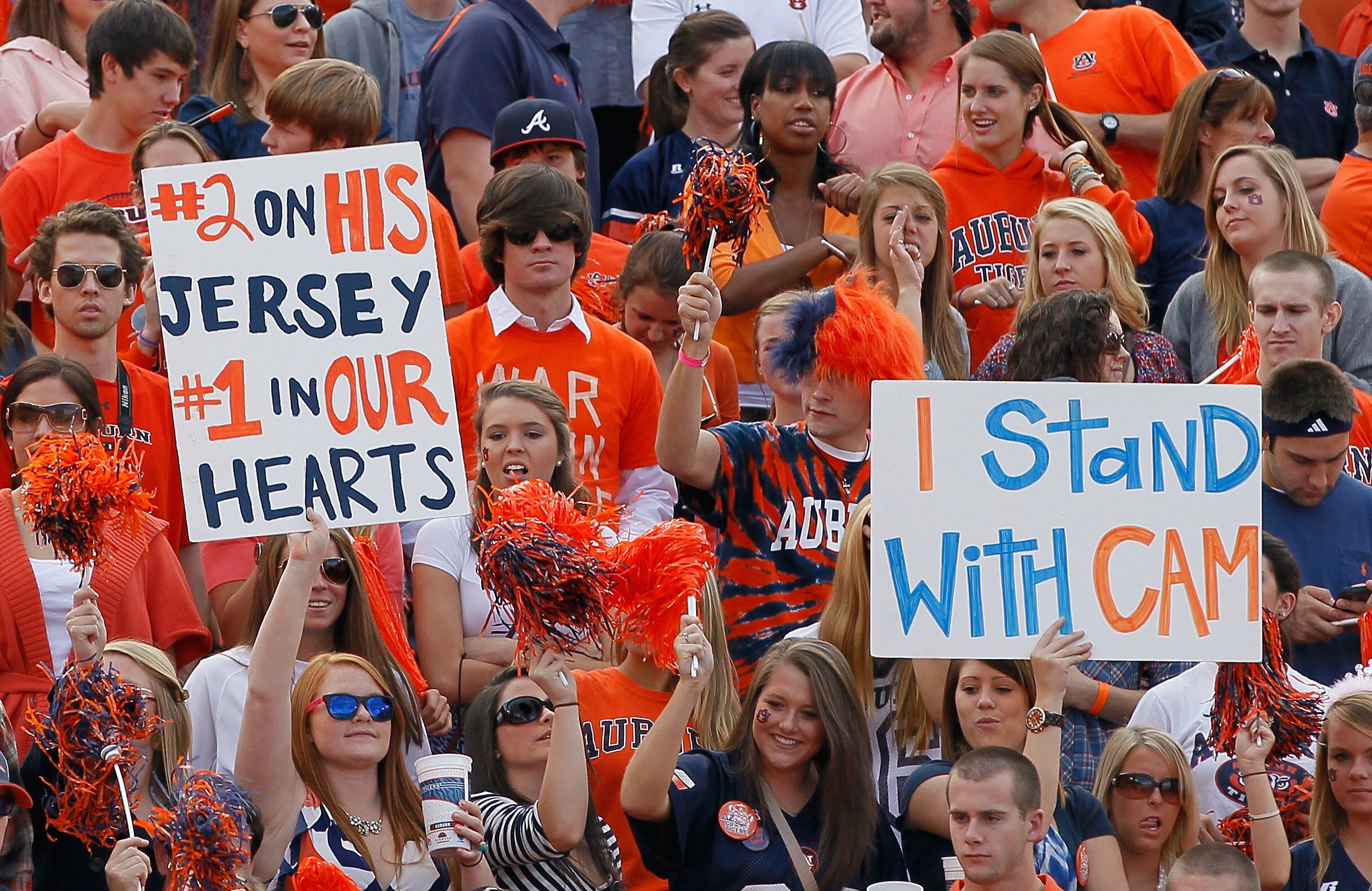 AUBURN, AL - NOVEMBER 13:  Fans hold up signs in support of quarterback Cameron Newton #2 of the Auburn Tigers before facing the Georgia Bulldogs at Jordan-Hare Stadium on November 13, 2010 in Auburn, Alabama.  (Photo by Kevin C. Cox/Getty Images)