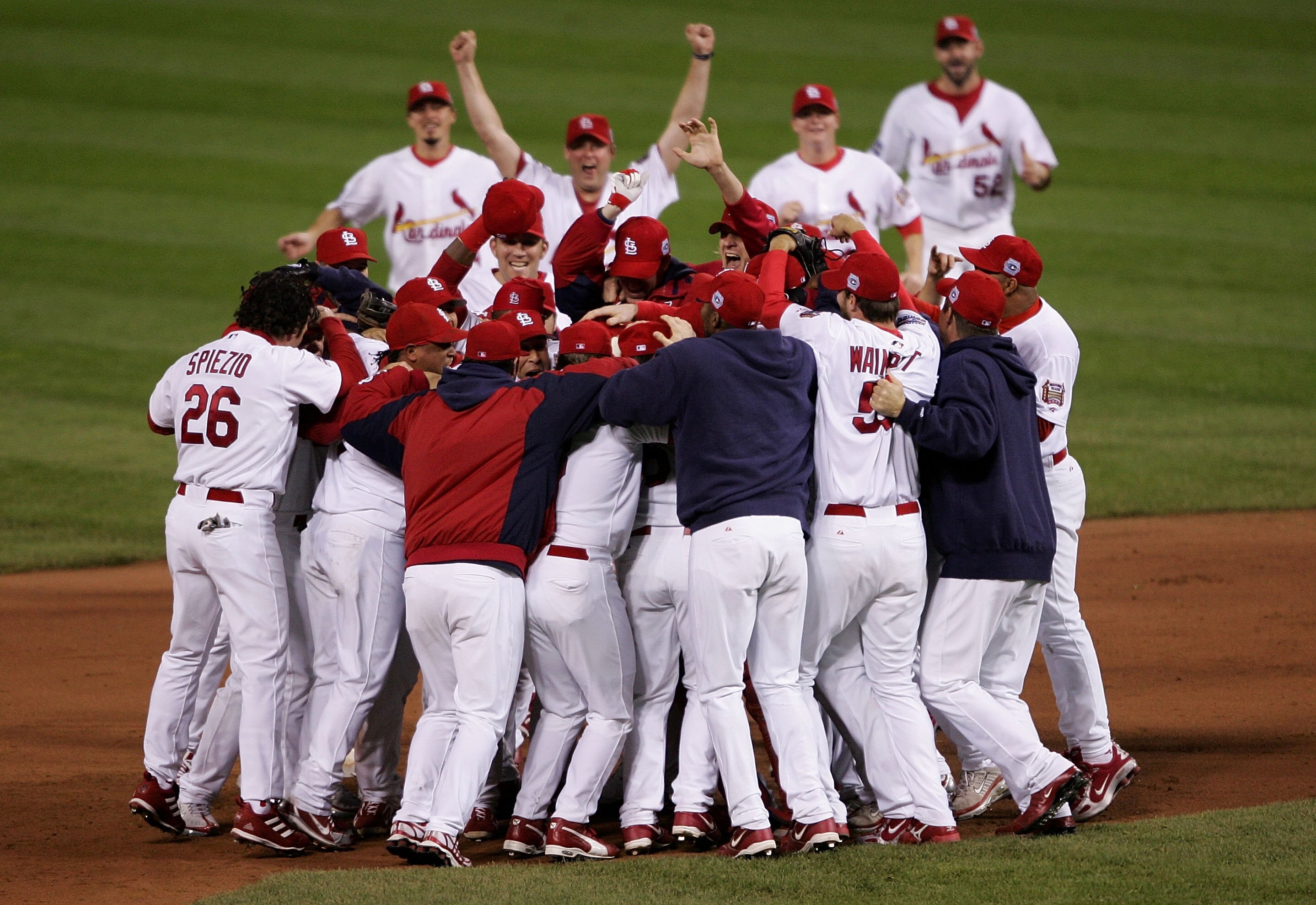 ST LOUIS, MO - OCTOBER 27:  The St. Louis Cardinals celebrate on the field after defeating the Detroit Tigers in Game Five of the 2006 World Series on October 27, 2006 at Busch Stadium in St. Louis, Missouri.  The Cardinals defeated the Tigers 4-2 to win