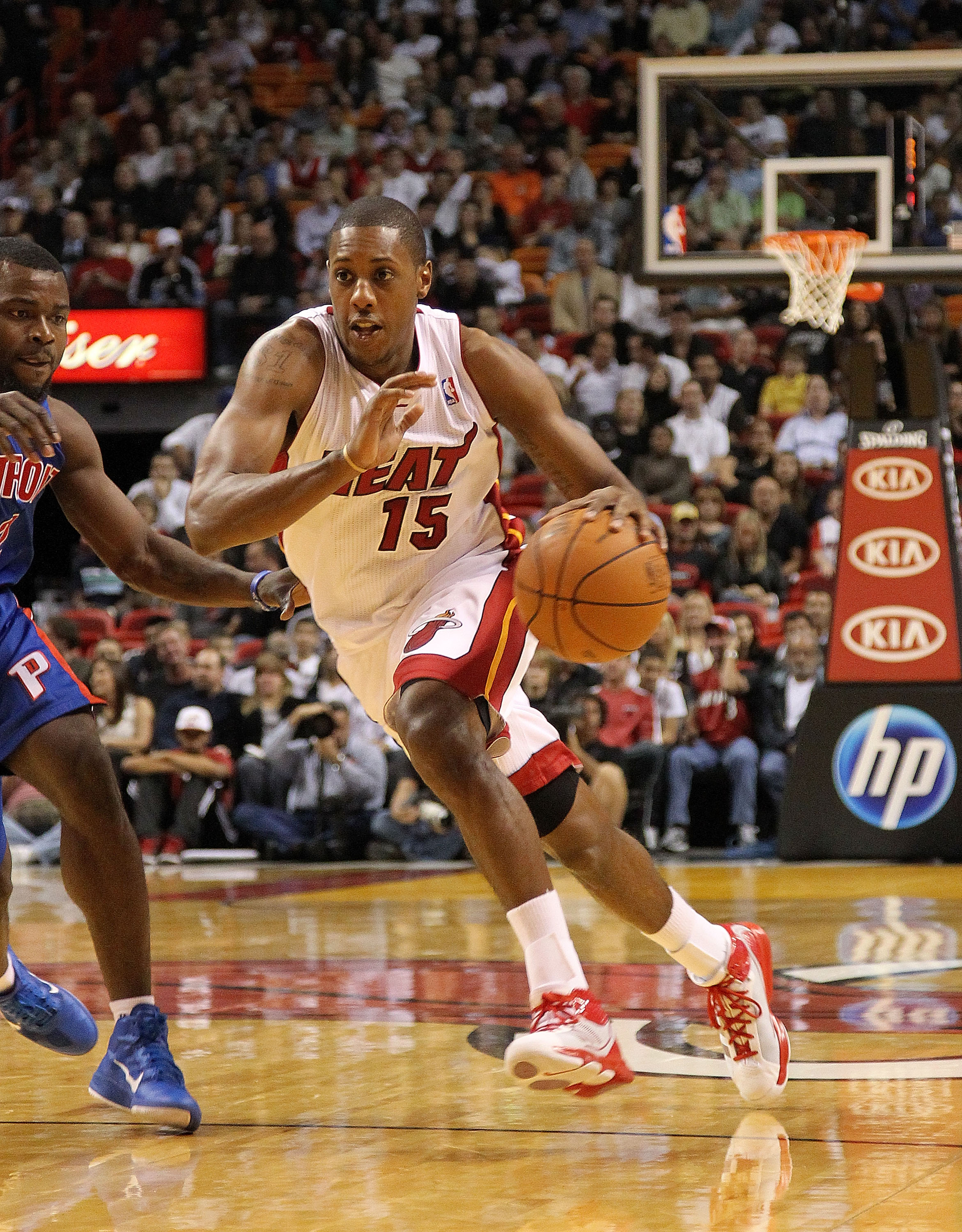 MIAMI, FL - DECEMBER 01:  Mario Chalmers #15 of the Miami Heat drives to the basket during a game against the Detroit Pistons at American Airlines Arena on December 1, 2010 in Miami, Florida. NOTE TO USER: User expressly acknowledges and agrees that, by d