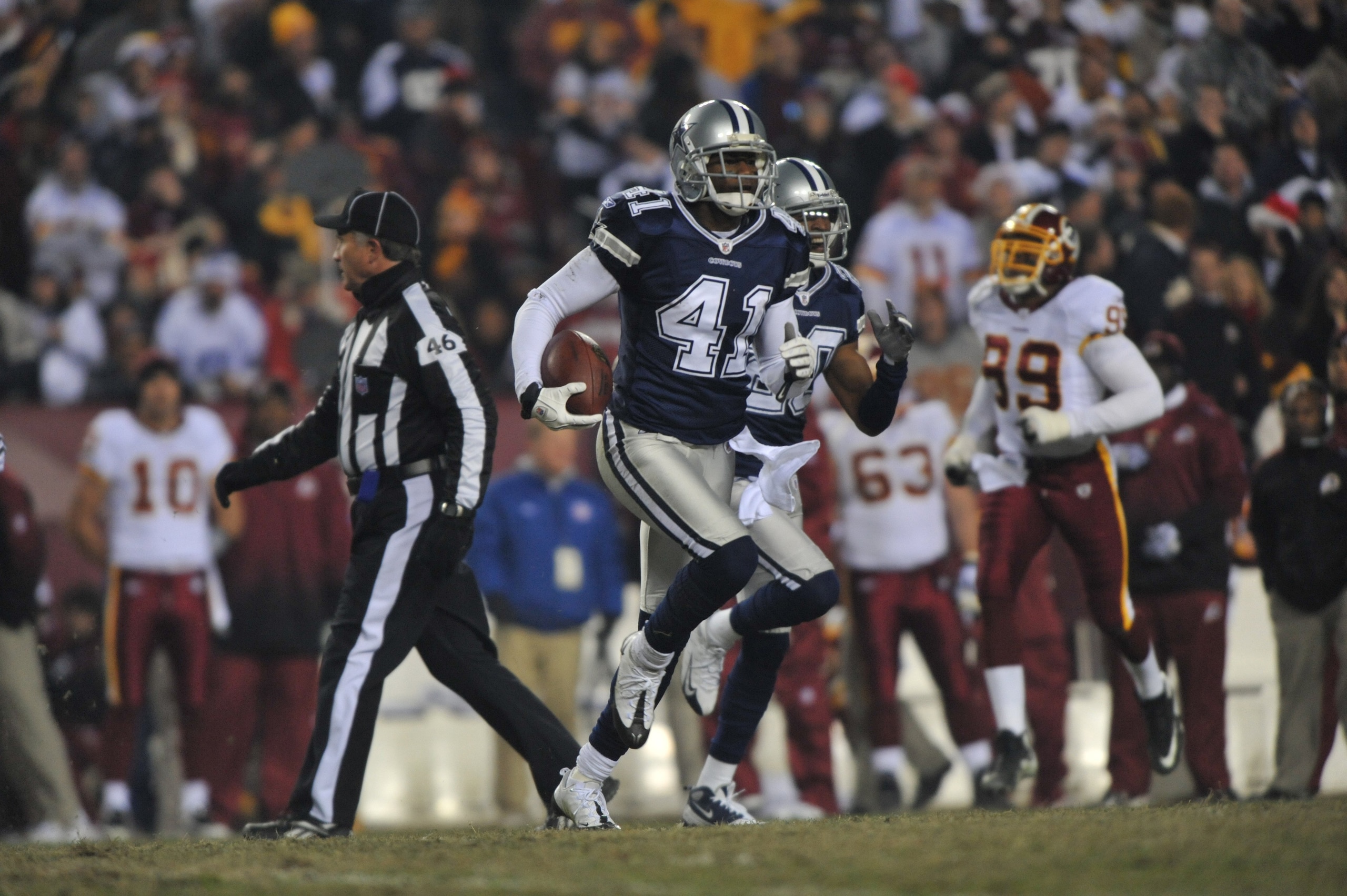 LANDOVER, MD - DECEMBER 27:  Terrence Newman #41 of the Dallas Cowboys runs the ball against the Washington Redskins at FedExField on December 27, 2009 in Landover, Maryland. The Cowboys defeated the Redskins 17-0. (Photo by Larry French/Getty Images)