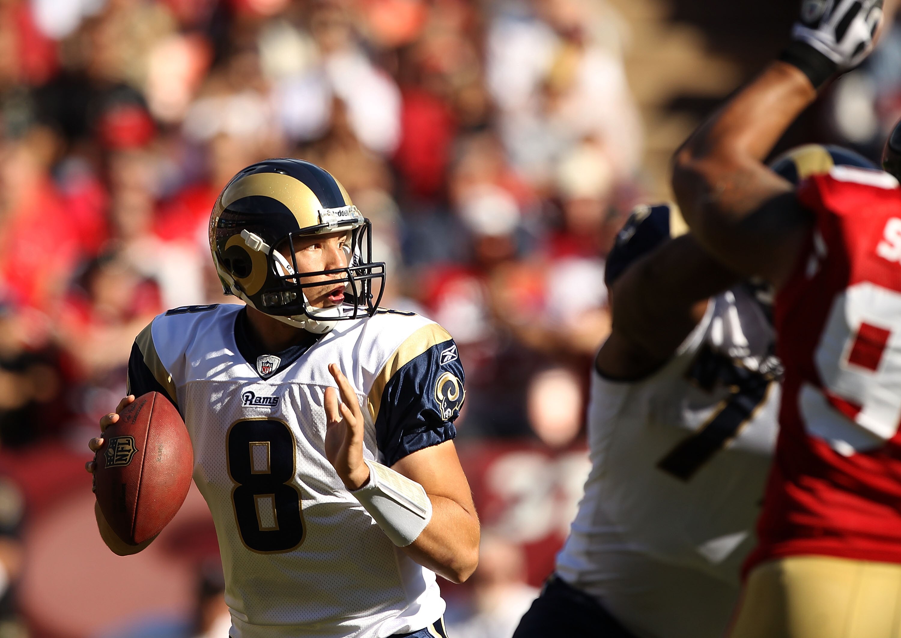 SAN FRANCISCO - NOVEMBER 14:  Sam Bradford #8  of the St. Louis Rams in action against the San Francisco 49ers at Candlestick Park on November 14, 2010 in San Francisco, California.  (Photo by Ezra Shaw/Getty Images)