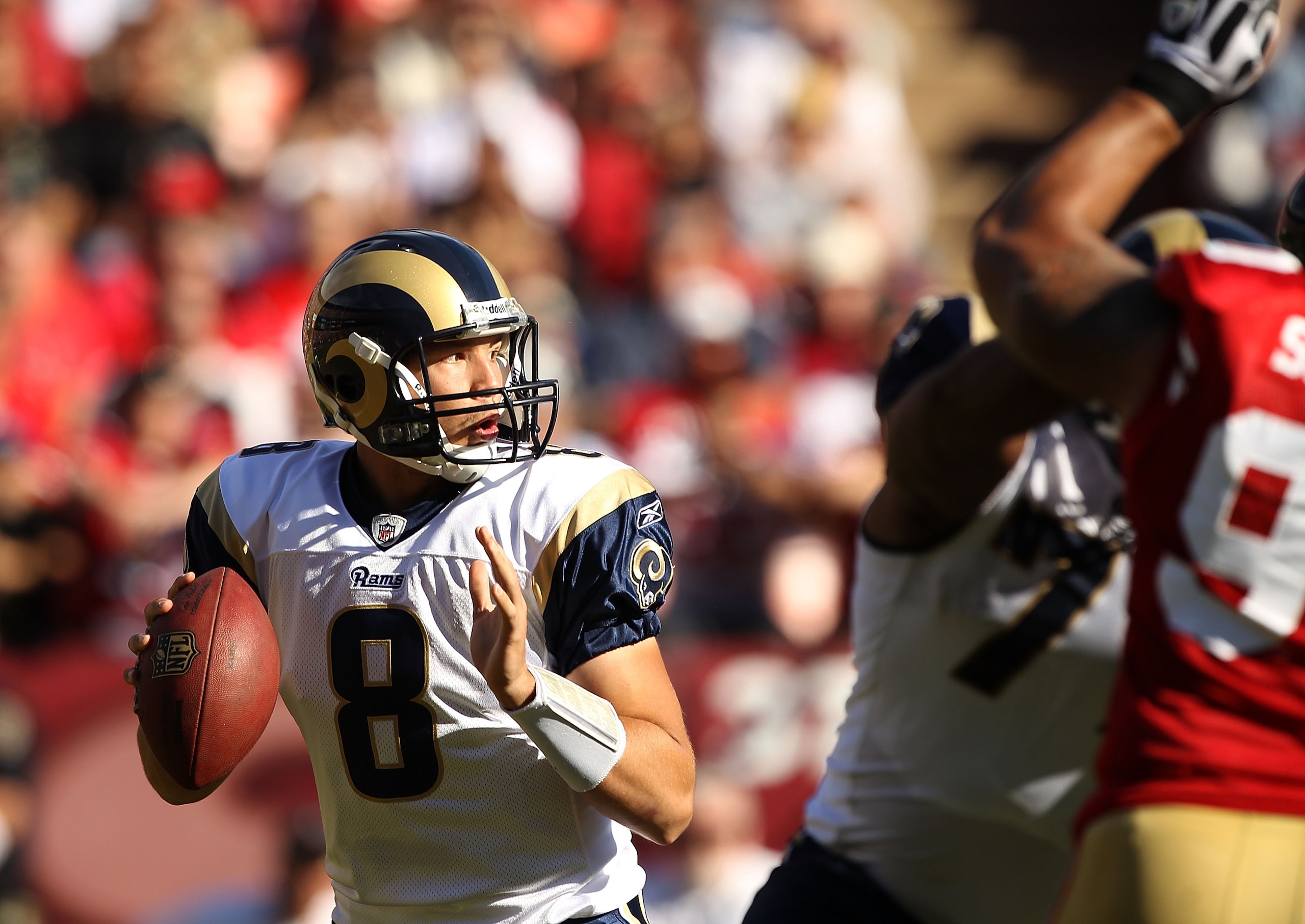 SAN FRANCISCO - NOVEMBER 14:  Sam Bradford #8  of the St. Louis Rams in action against the San Francisco 49ers at Candlestick Park on November 14, 2010 in San Francisco, California.  (Photo by Ezra Shaw/Getty Images)