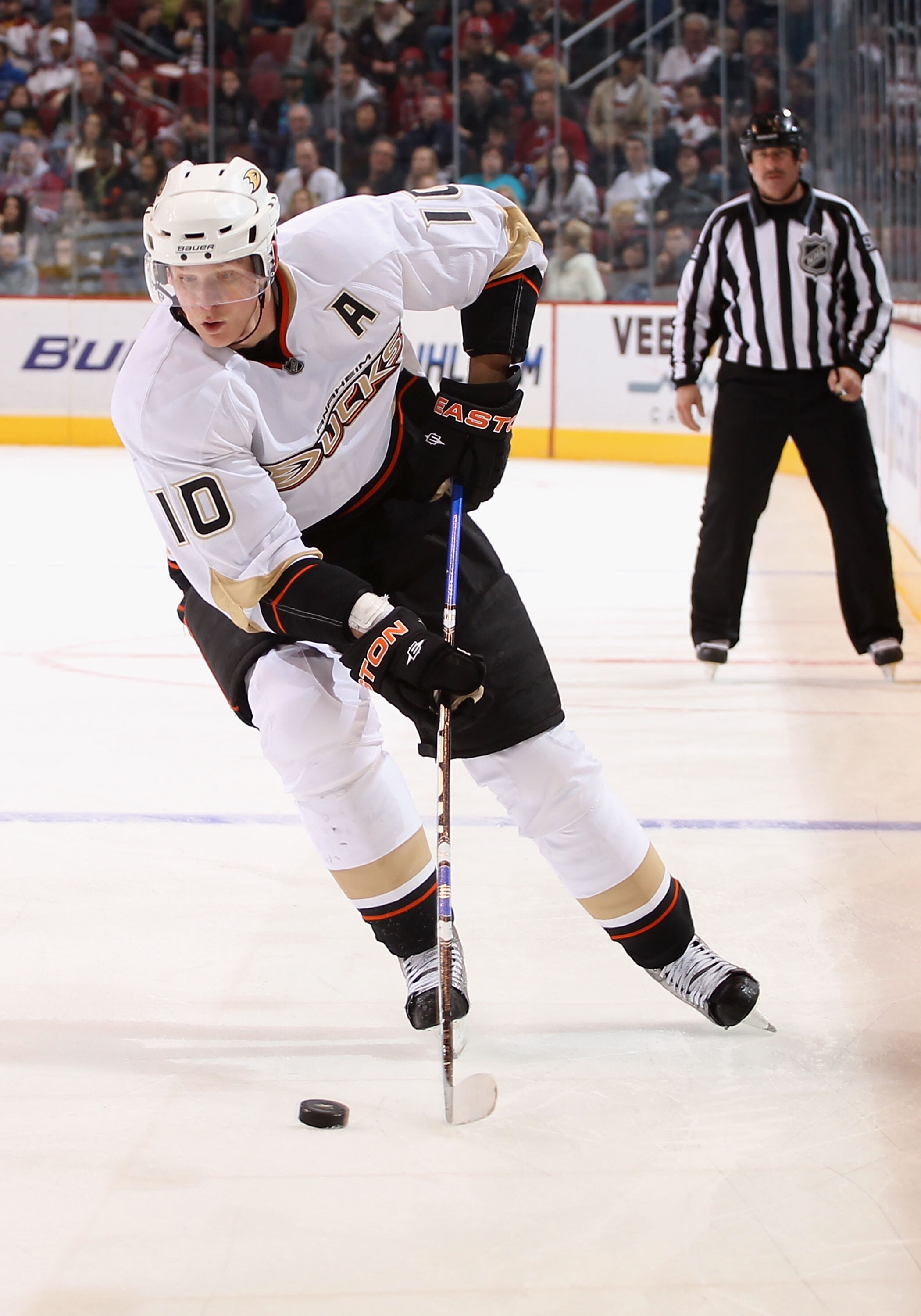 GLENDALE, AZ - NOVEMBER 27:  Corey Perry #10 of the Anaheim Ducks skates with the puck during the NHL game against the Phoenix Coyotes at Jobing.com Arena on November 27, 2010 in Glendale, Arizona.   The Ducks defeated the Coyotes 6-4.  (Photo by Christia