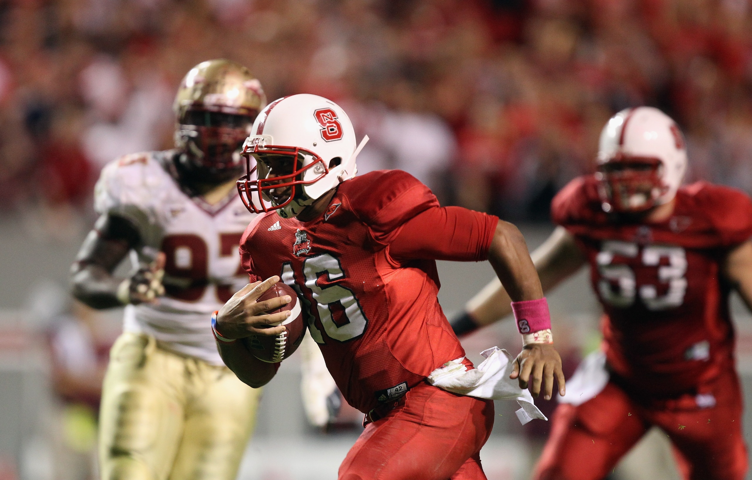 RALEIGH, NC - OCTOBER 28:  Russell Wilson #16 of the North Carolina State Wolfpack runs with the ball against the Florida State Seminoles during their game at Carter-Finley Stadium on October 28, 2010 in Raleigh, North Carolina.  (Photo by Streeter Lecka/