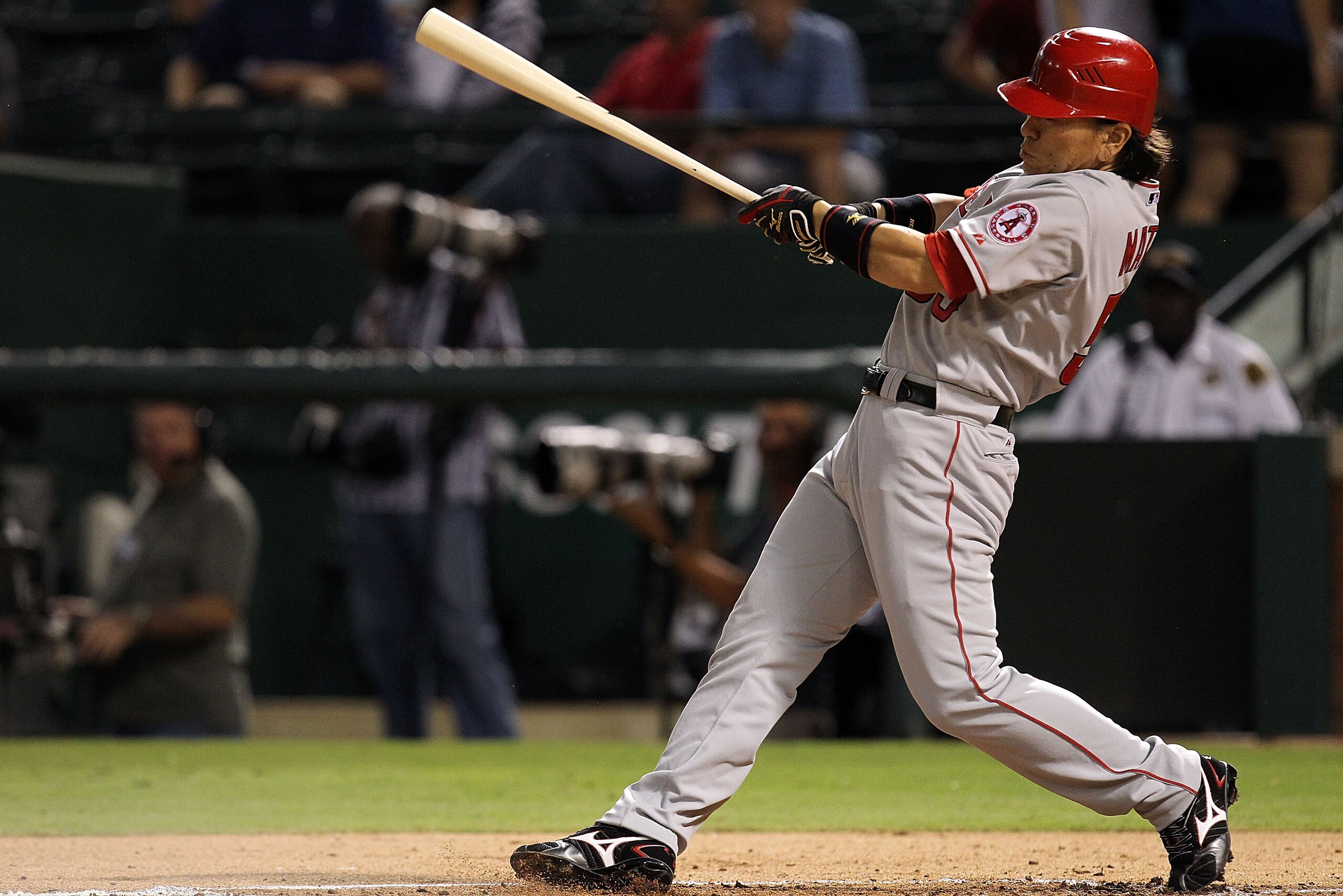 ARLINGTON, TX - OCTOBER 01:  Designated hitter Hideki Matsui #55 of the Los Angeles Angels of Anaheim grounds out in the first inning against the Texas Rangers at Rangers Ballpark in Arlington on October 1, 2010 in Arlington, Texas.  (Photo by Ronald Mart
