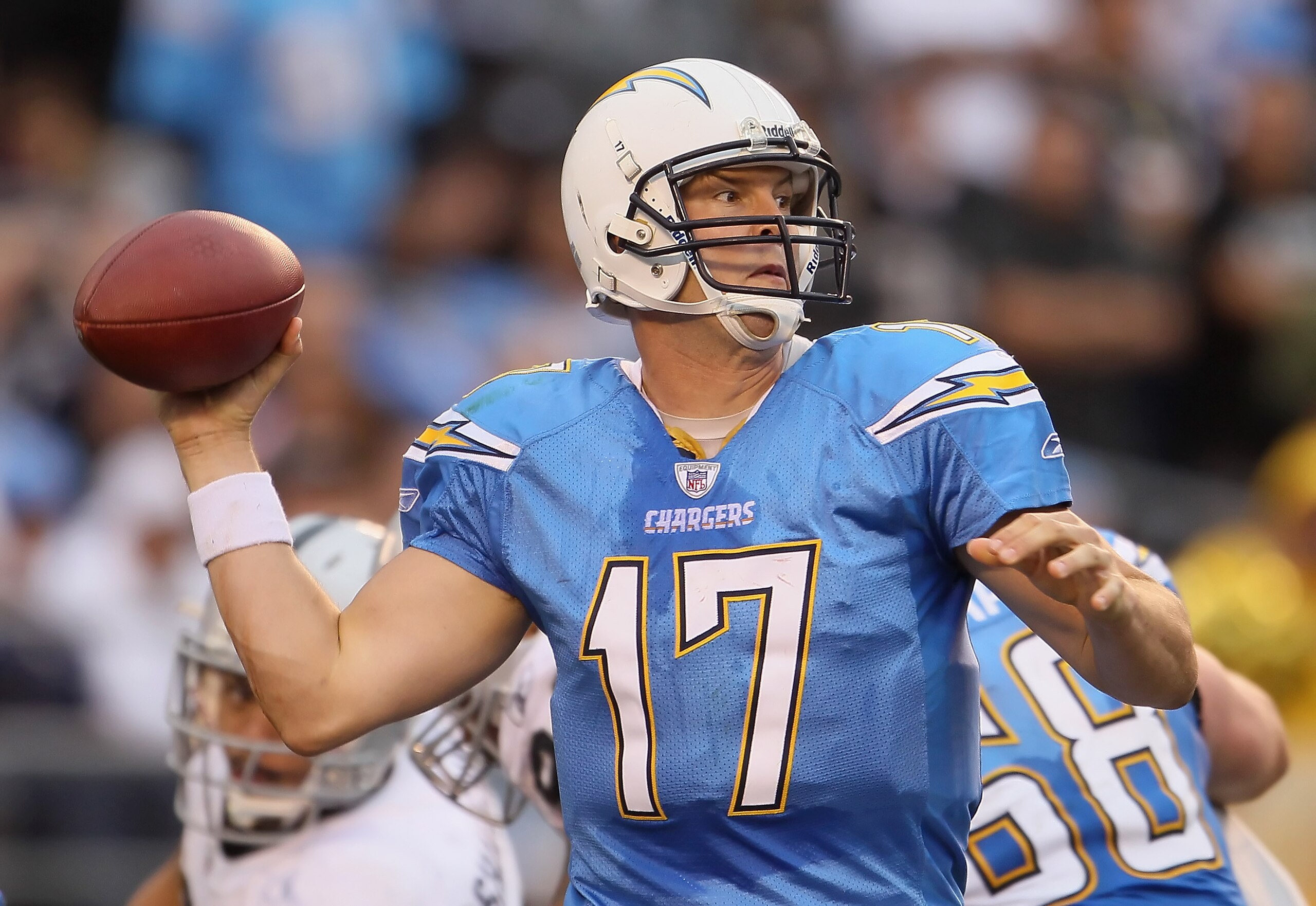 SAN DIEGO - DECEMBER 05:  Quarterback Philip Rivers #17 of the San Diego Chargers drops back to pass in the fourth quarter against the Oakland Raiders at Qualcomm Stadium on December 5, 2010 in San Diego, California. The Raiders defeated the Chargers 28-1
