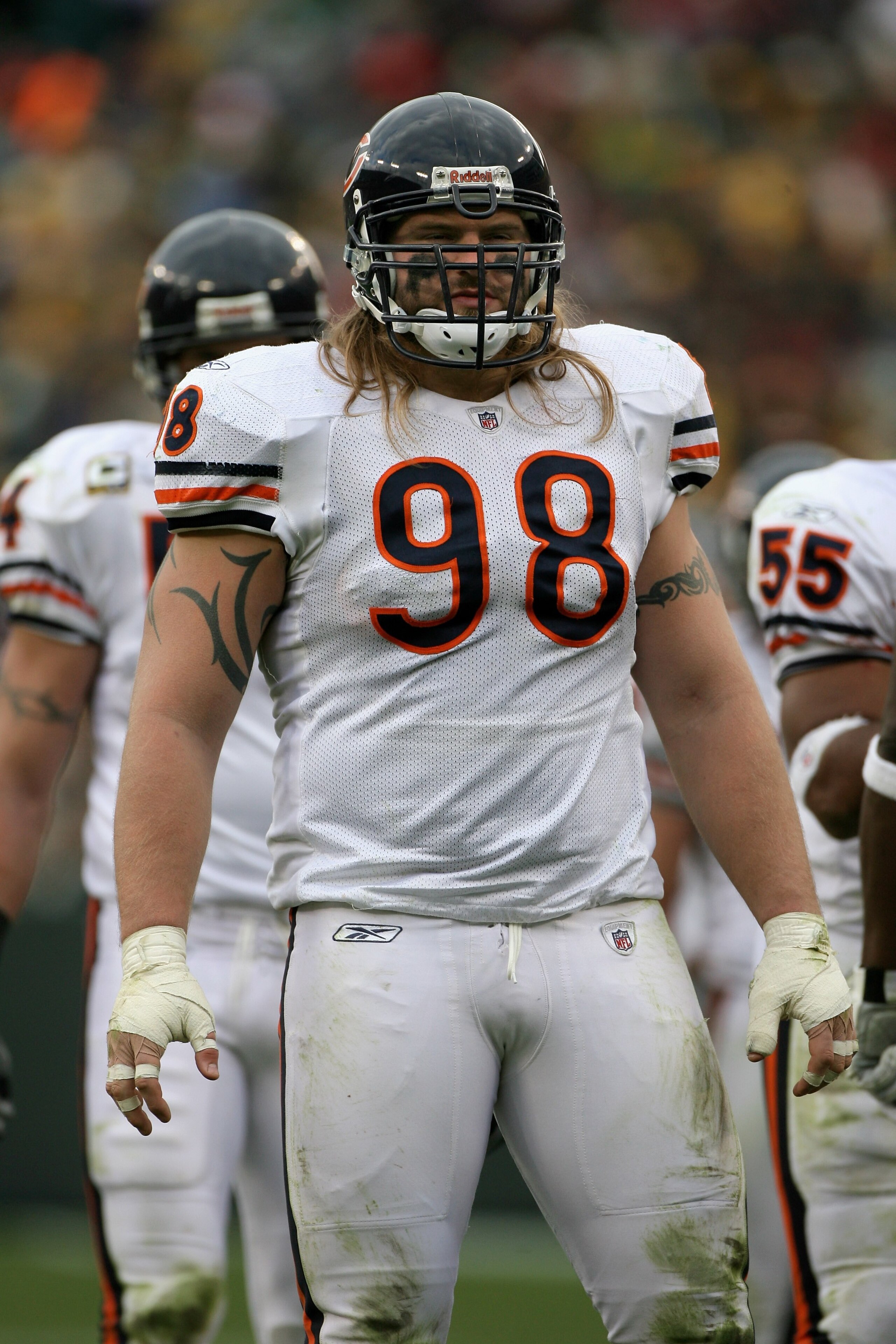 GREEN BAY, WI - NOVEMBER 16:  Defensive tackle Dusty Dvoracek #98 of the Chicago Bears awaits action at the line of scrimmage as he defends against the Green Bay Packers during NFL action at Lambeau Field on November 16, 2008 in Green Bay, Wisconsin. The