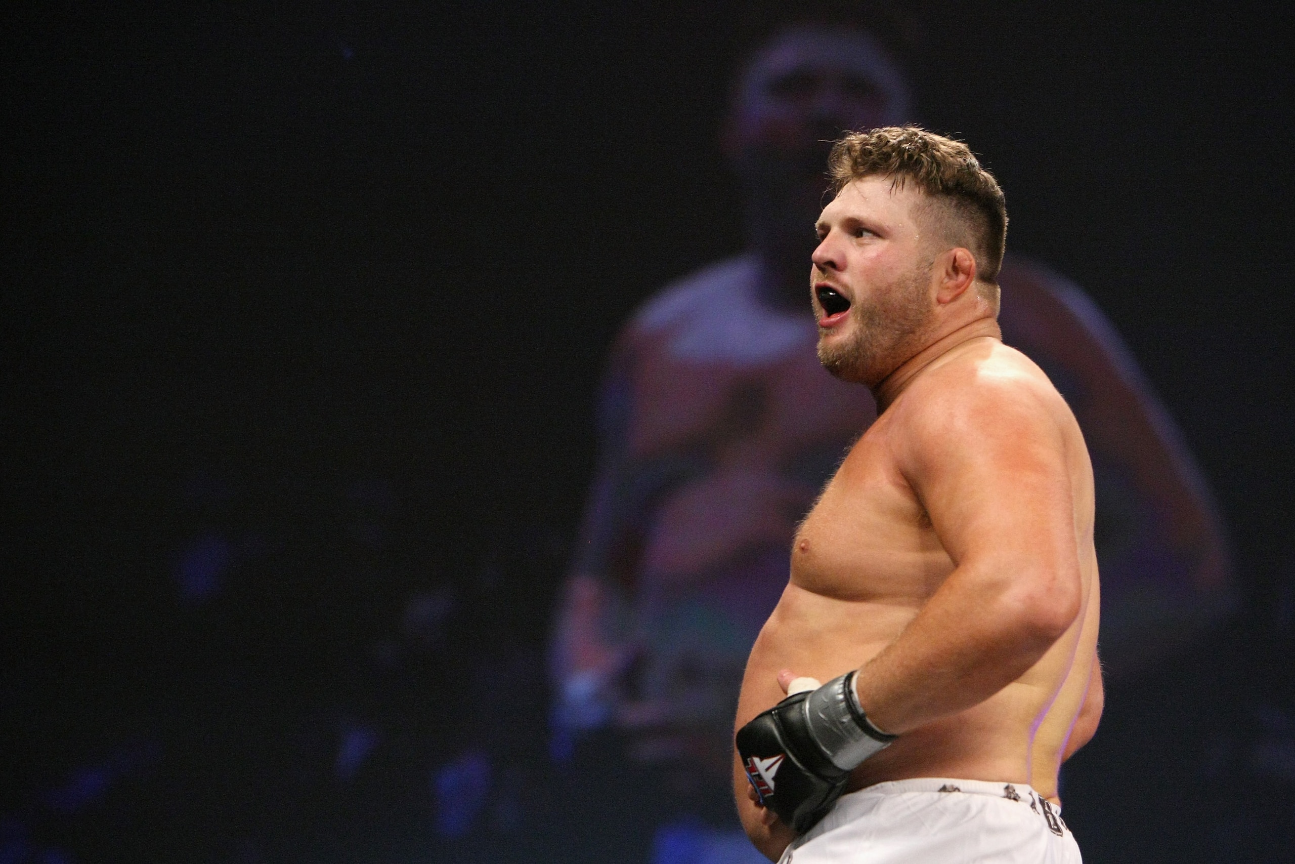 UNCASVILLE, CT - MAY 16: Roy Nelson (White Trunks) of the Lions Den celebrates after beating Brad Imes MilesTech Fighting System during their bout presented by the International Fighting League at the Mohegan Sun Arena May 16, 2008 in Uncasville, Connecti
