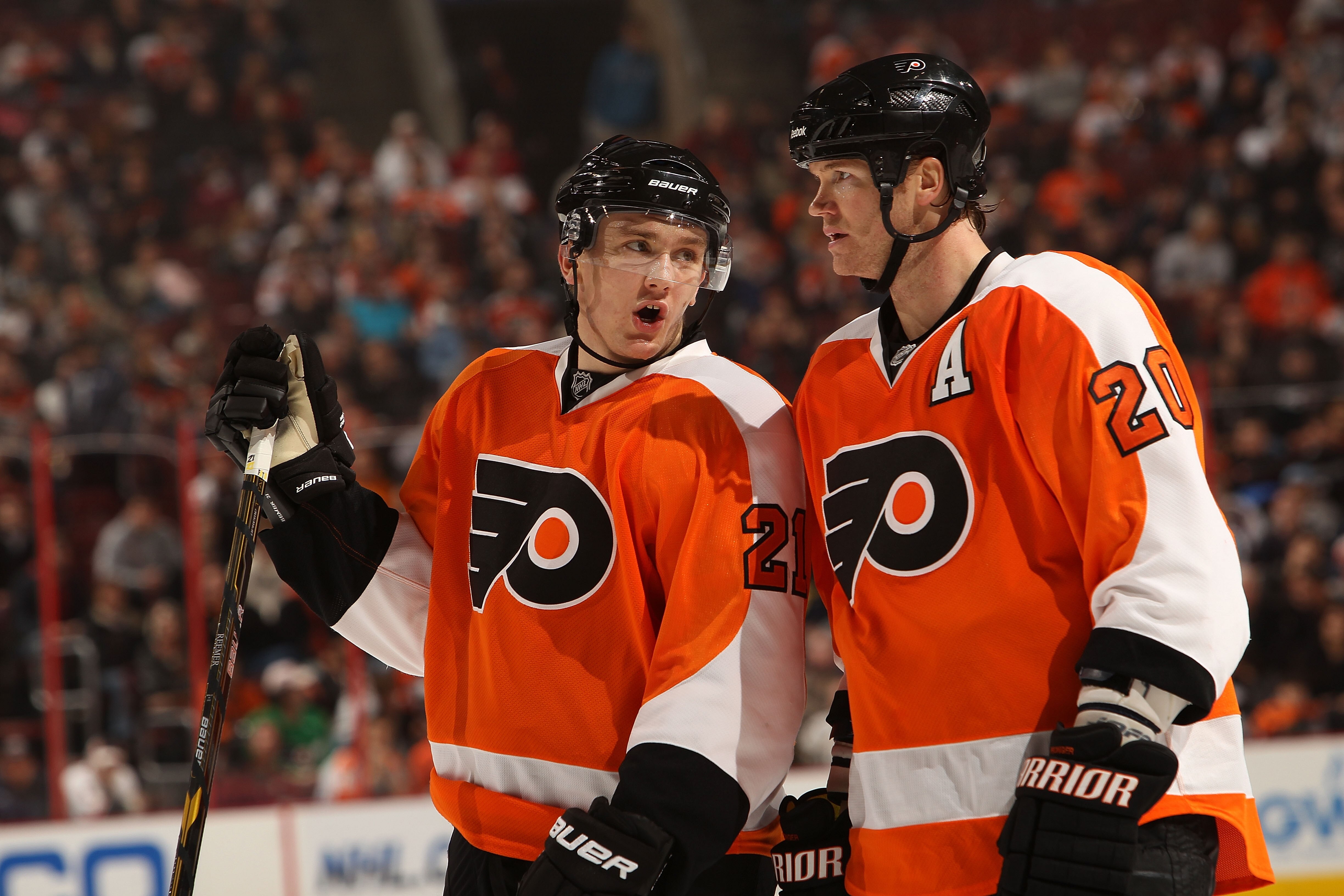 PHILADELPHIA, PA - DECEMBER 01: James van Riemsdyk #21 of the Philadelphia Flyers talks with teammate Chris Pronger #20 against the Boston Bruins at the Wells Fargo Center on December 1, 2010 in Philadelphia, Pennsylvania.  (Photo by Nick Laham/Getty Imag