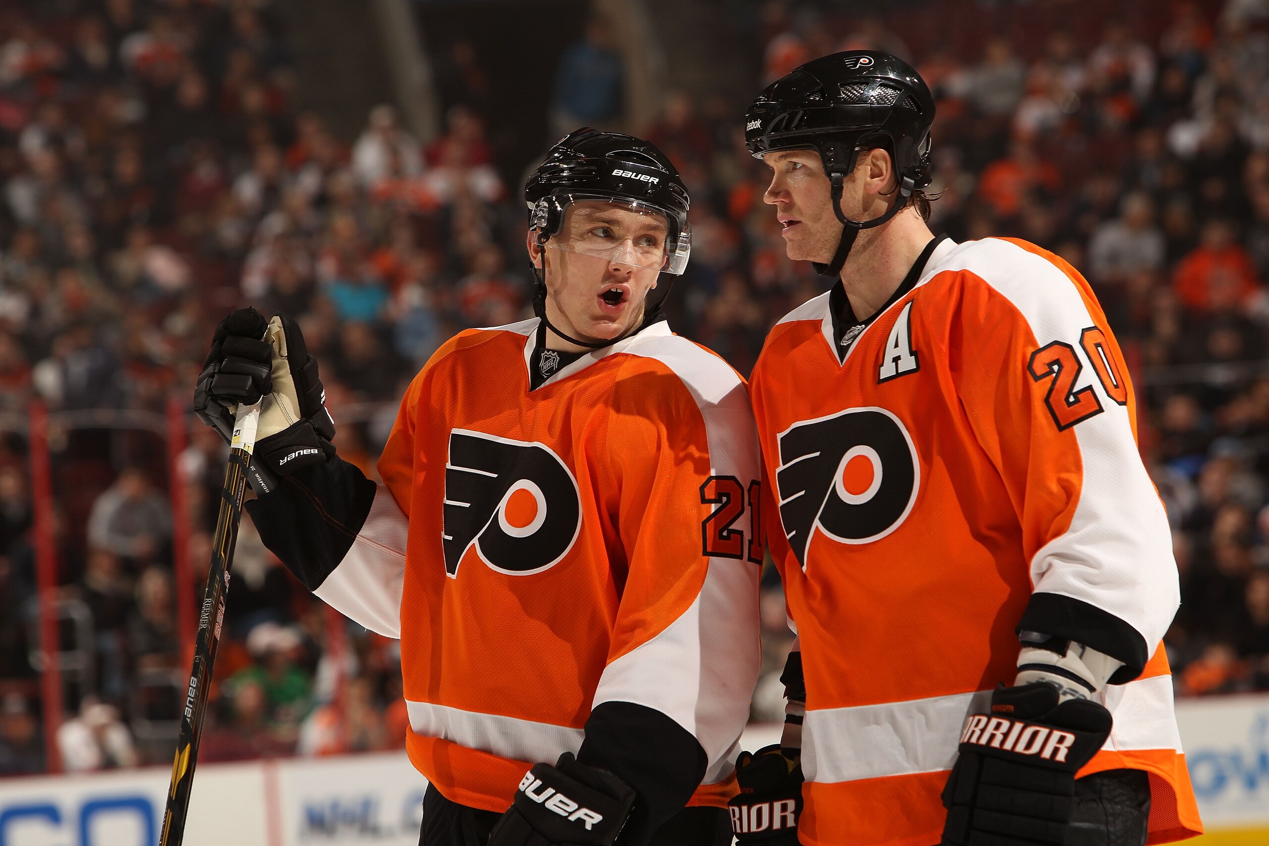 PHILADELPHIA, PA - DECEMBER 01: James van Riemsdyk #21 of the Philadelphia Flyers talks with teammate Chris Pronger #20 against the Boston Bruins at the Wells Fargo Center on December 1, 2010 in Philadelphia, Pennsylvania.  (Photo by Nick Laham/Getty Imag